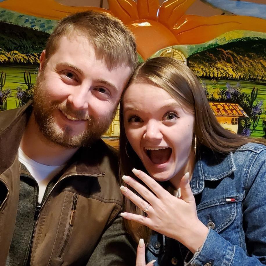 Celebrating our engagement in Carroll at Amber's hometown Mexican restaurant. Amber's favorite server, Elazar, gifted us free churros as a gift to celebrate our news!