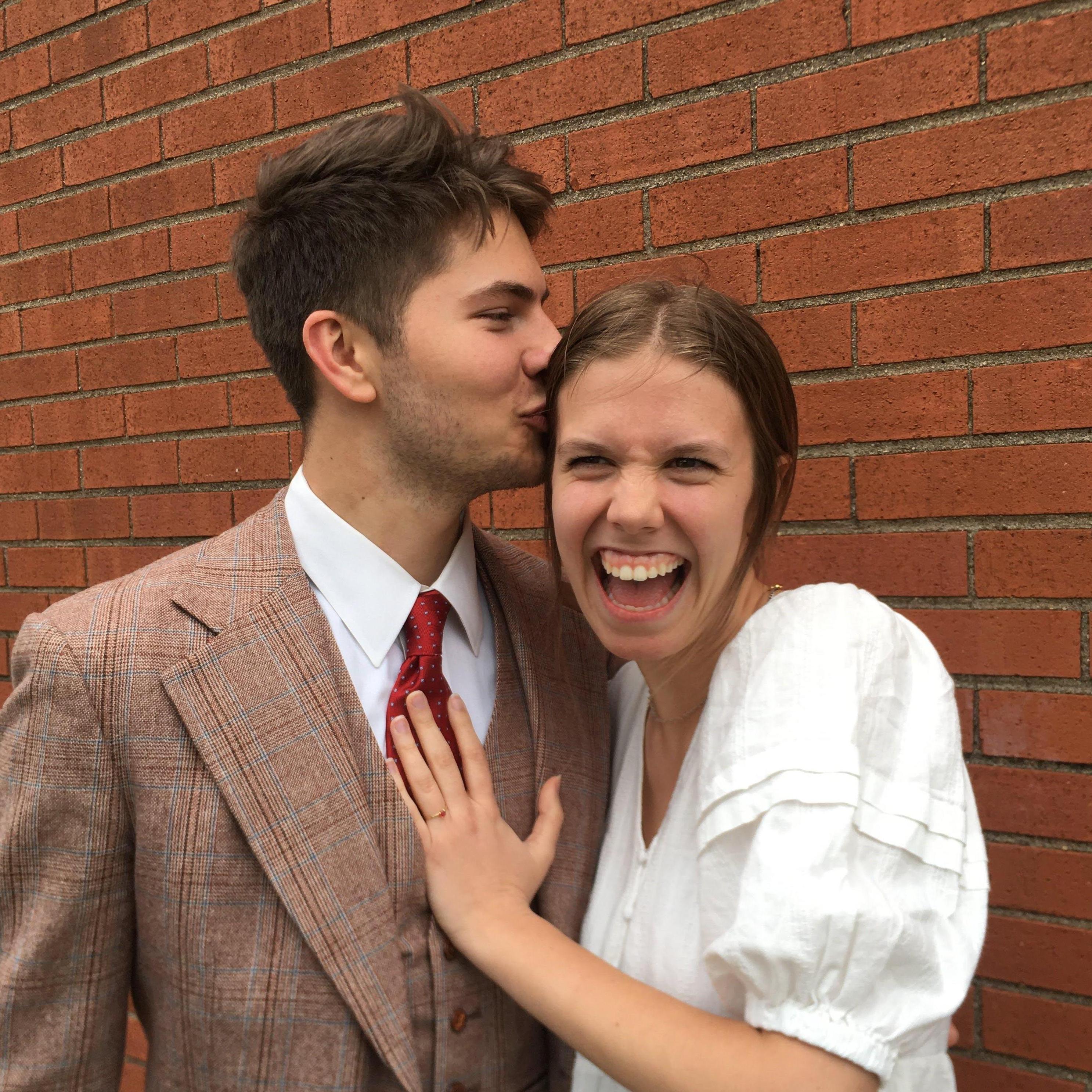 The big day on April 11, 2021! Paul got down on one knee at our favorite little grotto dedicated to Mary in a field on campus and proposed with a beautiful ruby ring!