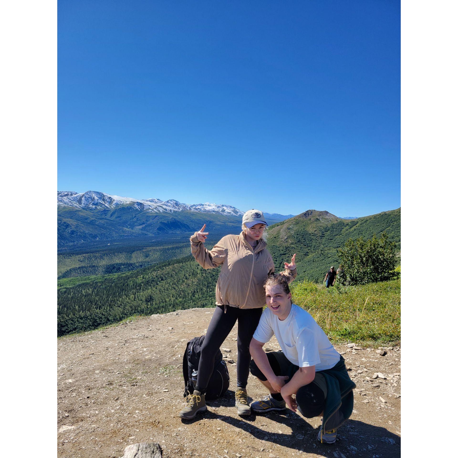 these two love to climb a mountain! here is them on top of one in Alaska with Denali in the background!