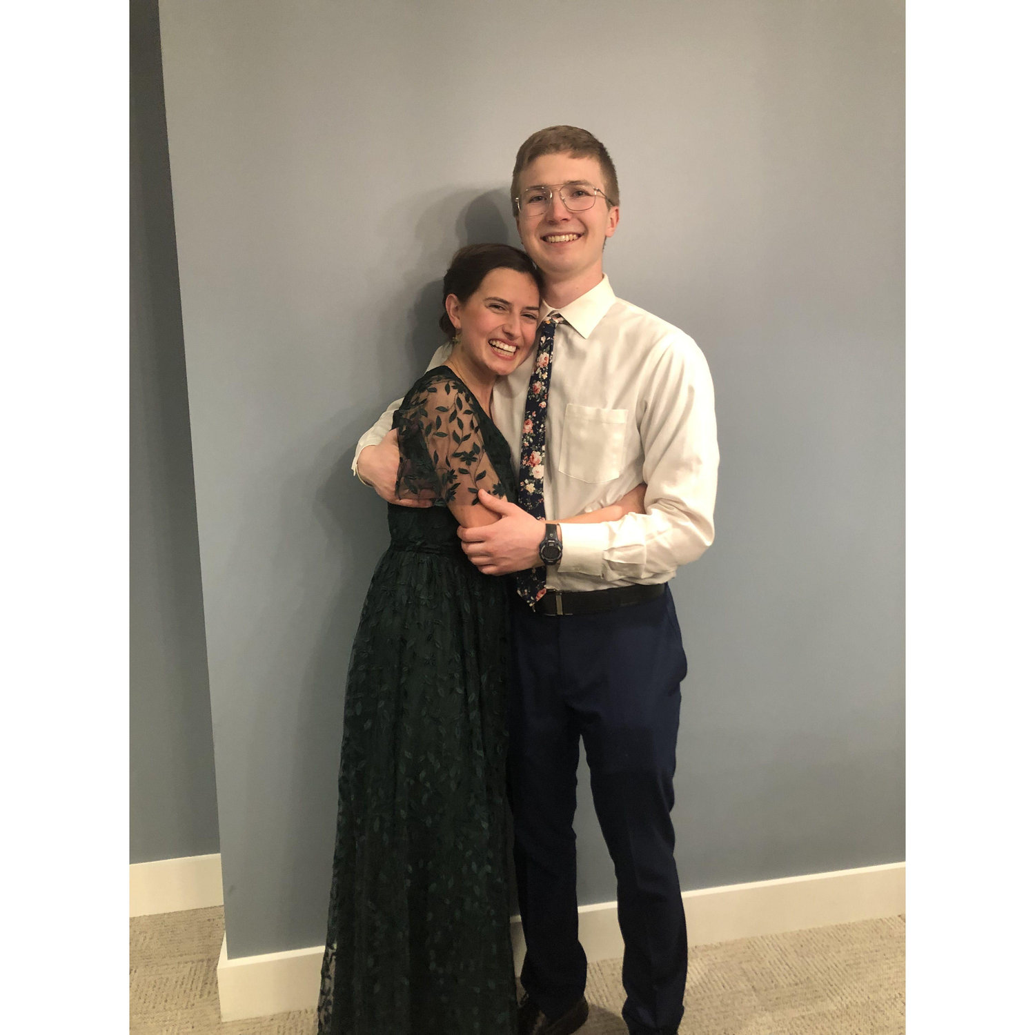 This photo was taken at Pres Ball in Hillsdale on February 17th, 2024. To both Lizzy and Peter's surprise, they were engaged less than 24 hours later