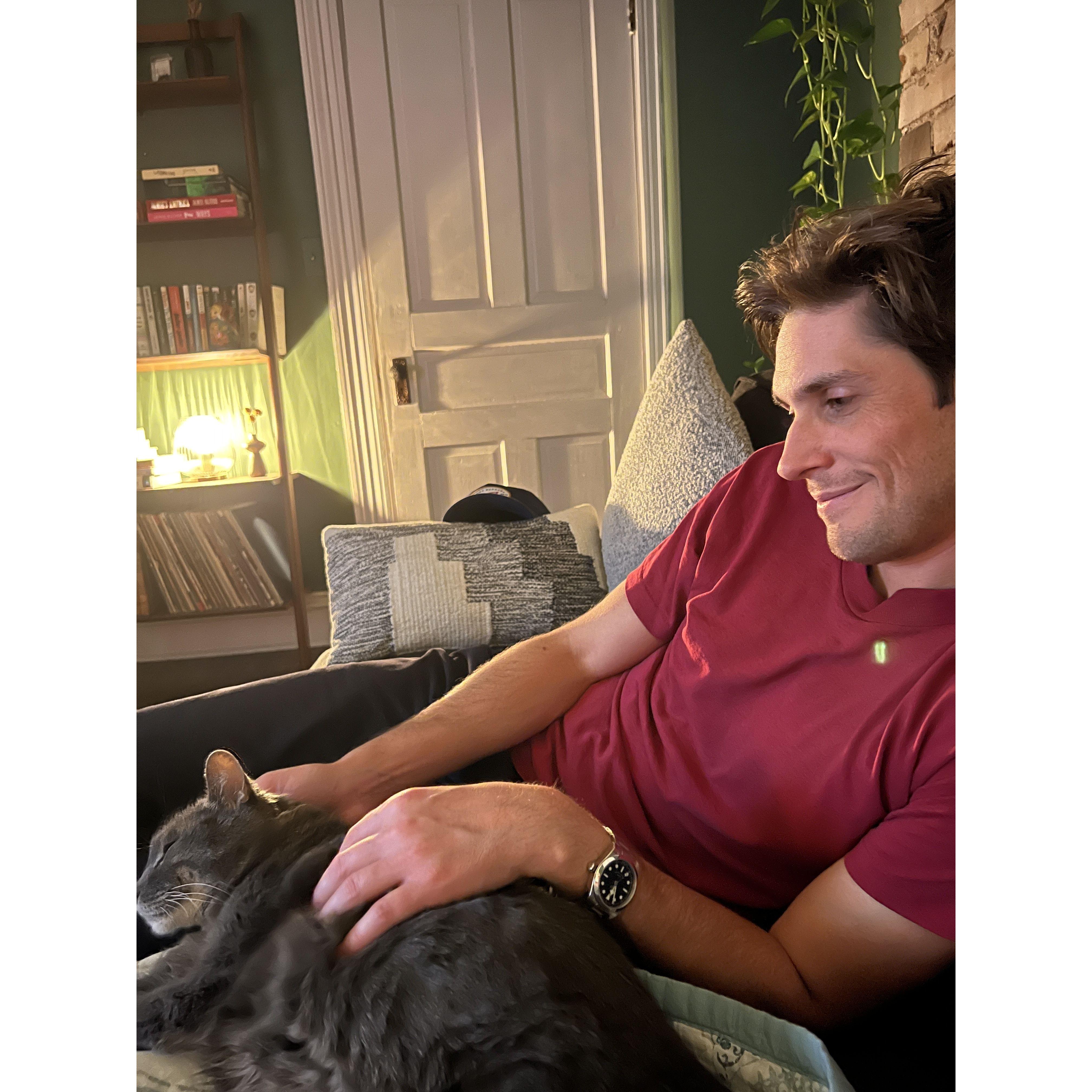 Cuddling up with our precious child, Lucy (AKA Bootsie)