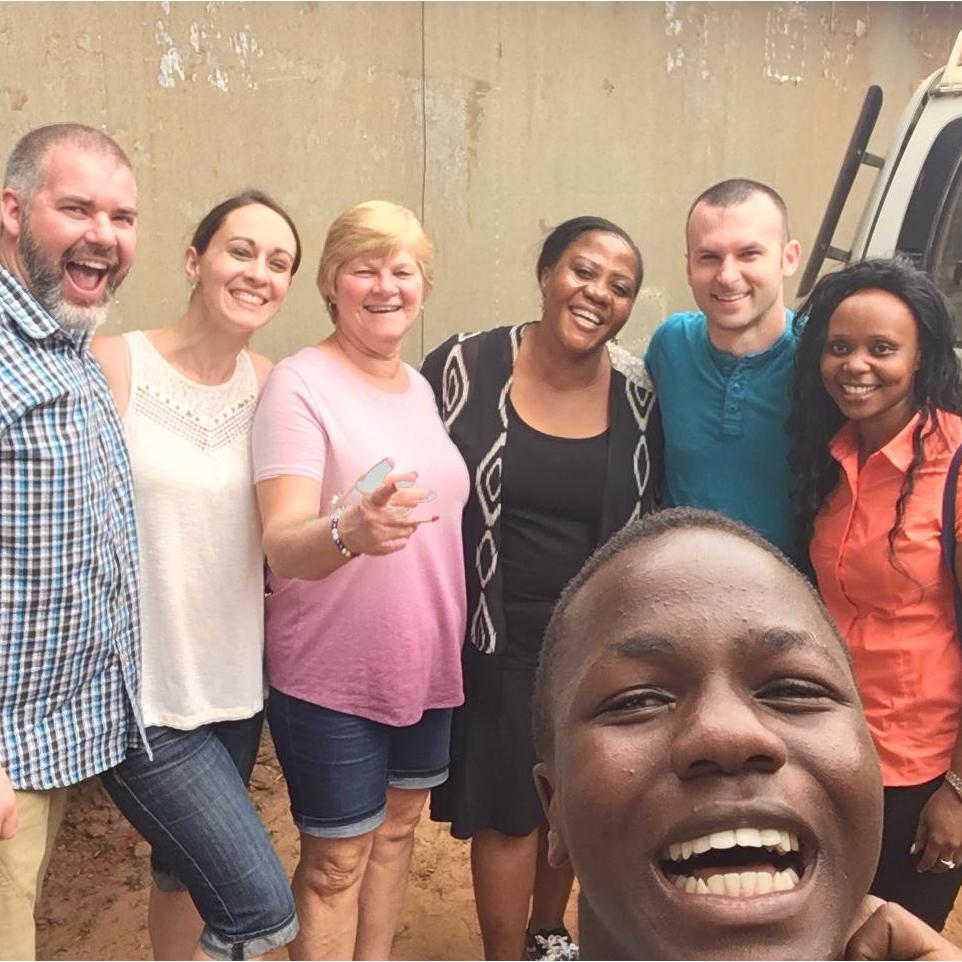 King David photobombing our group photo in Uganda.
Kevin, Jackie, Bonnie, Penny, Eric, and Kemi
