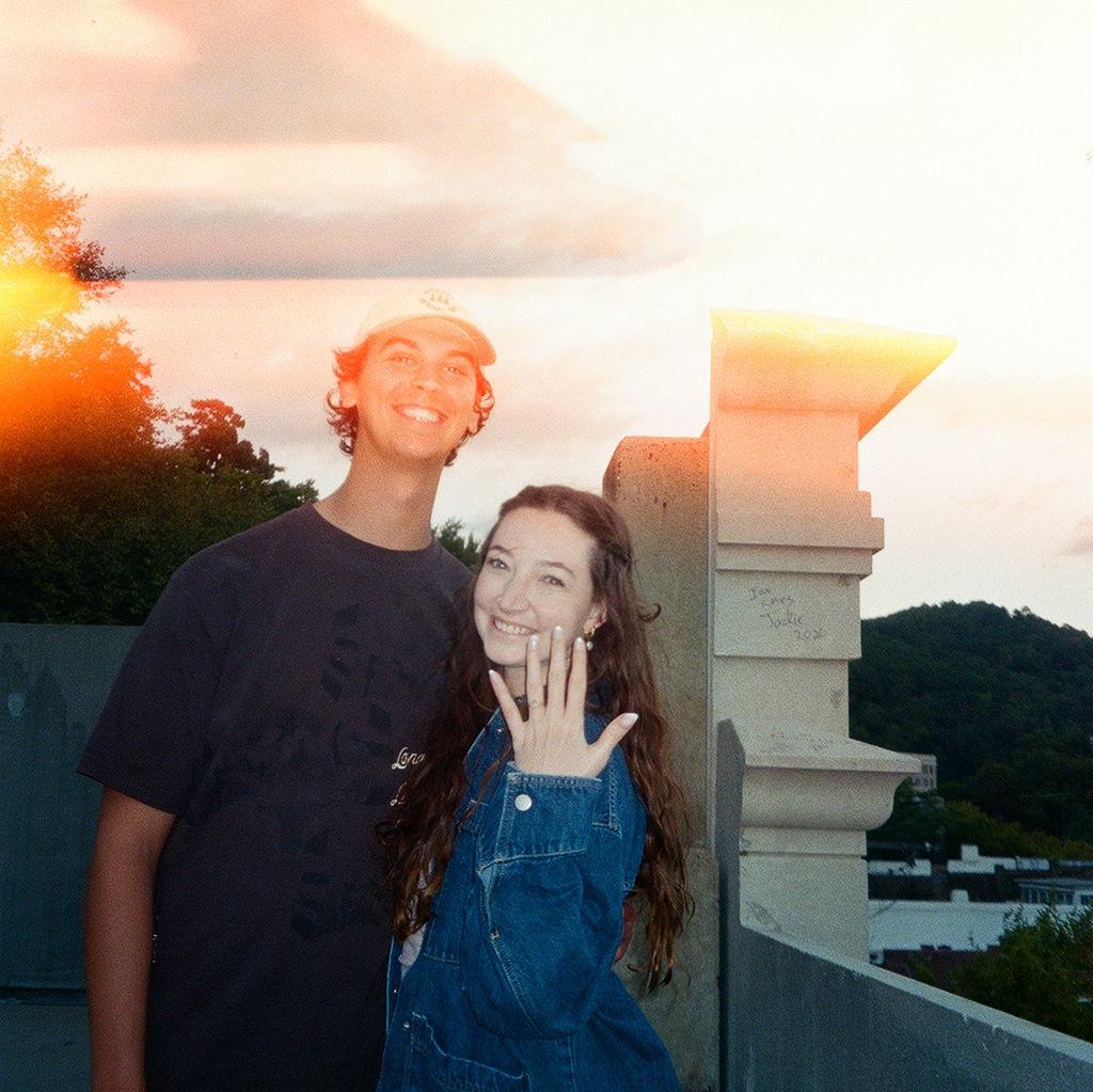 Newly engaged! After their day in the park, Courtney and Marcus celebrated privately with their favorite vacation dinner: pizza and cider. The pizza was horrible, but nothing could dull this night.