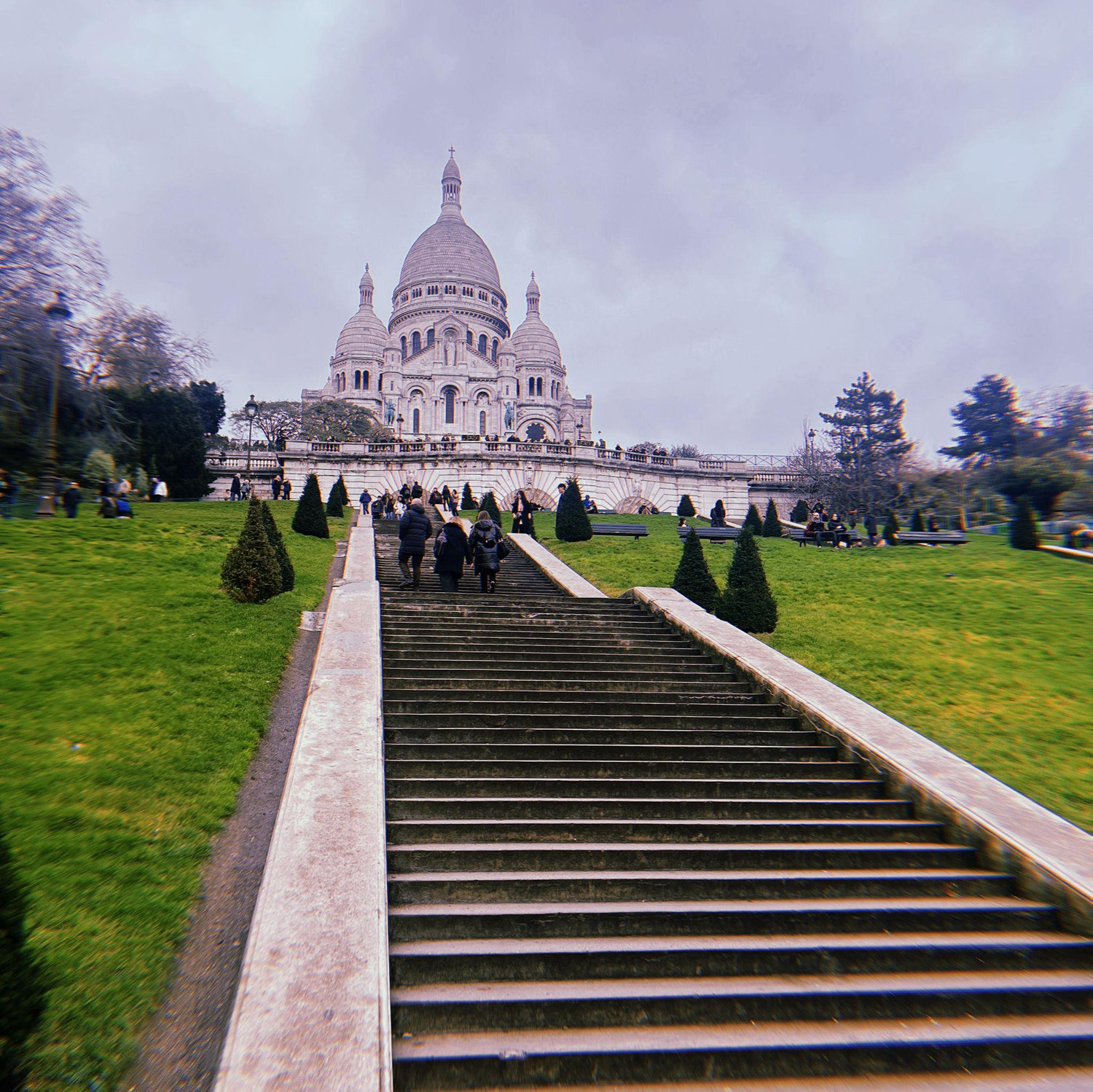 Walk the steps of Sacré-Cœur Basilica for beautiful views!