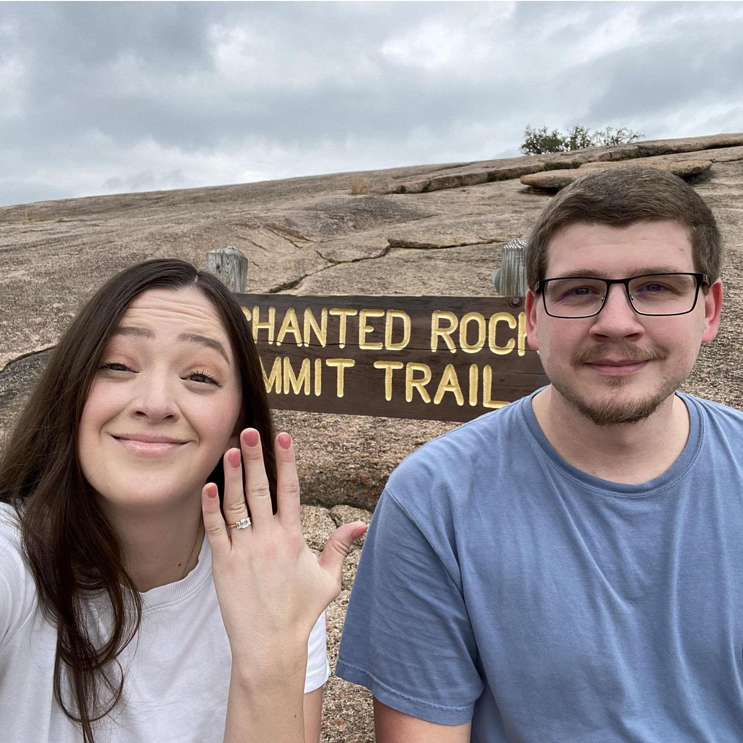 immediately summited enchanted rock after our proposal - this is our victory picture (2022)