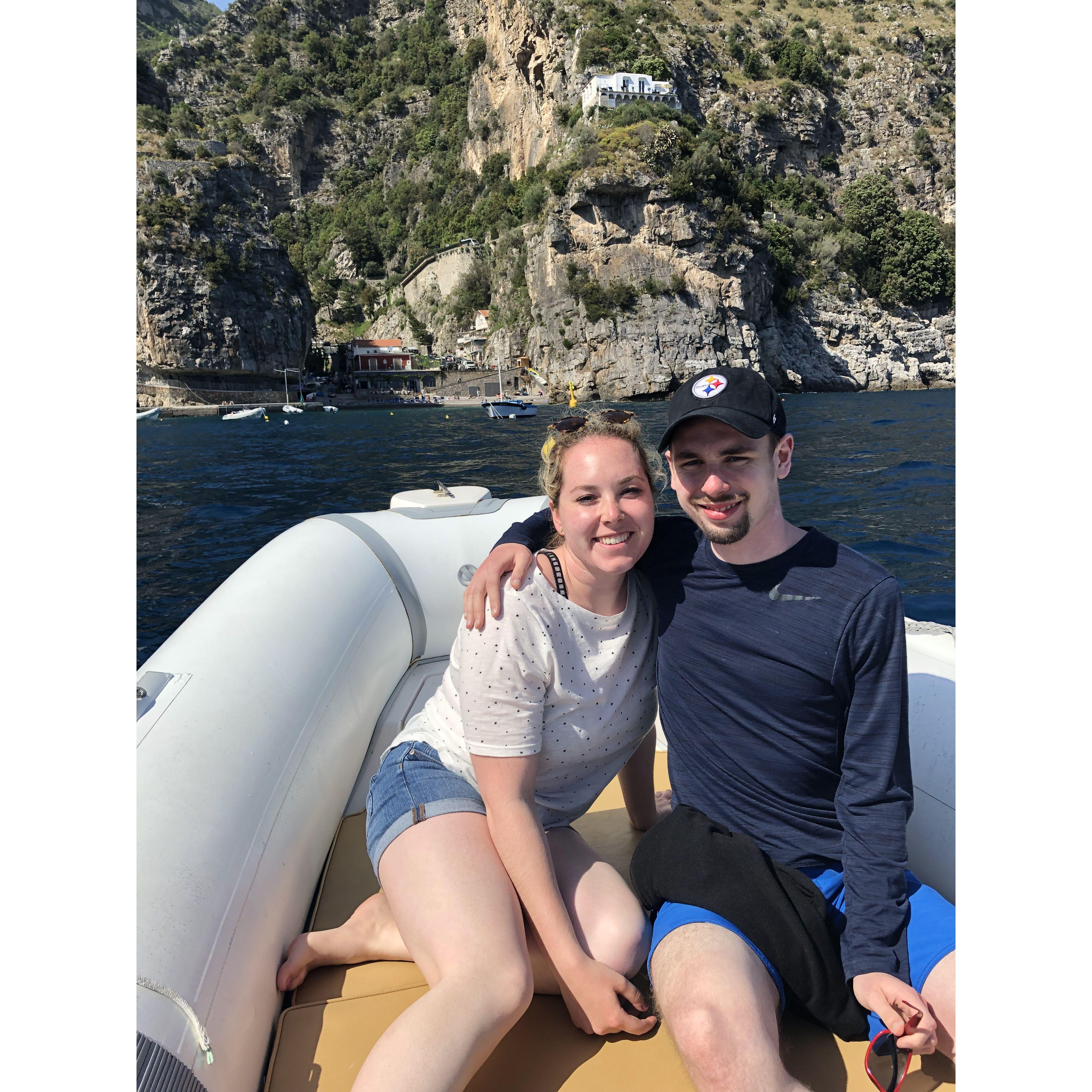Olivia and Vince on a boat ride off the Amalfi Coast in Italy in 2019.