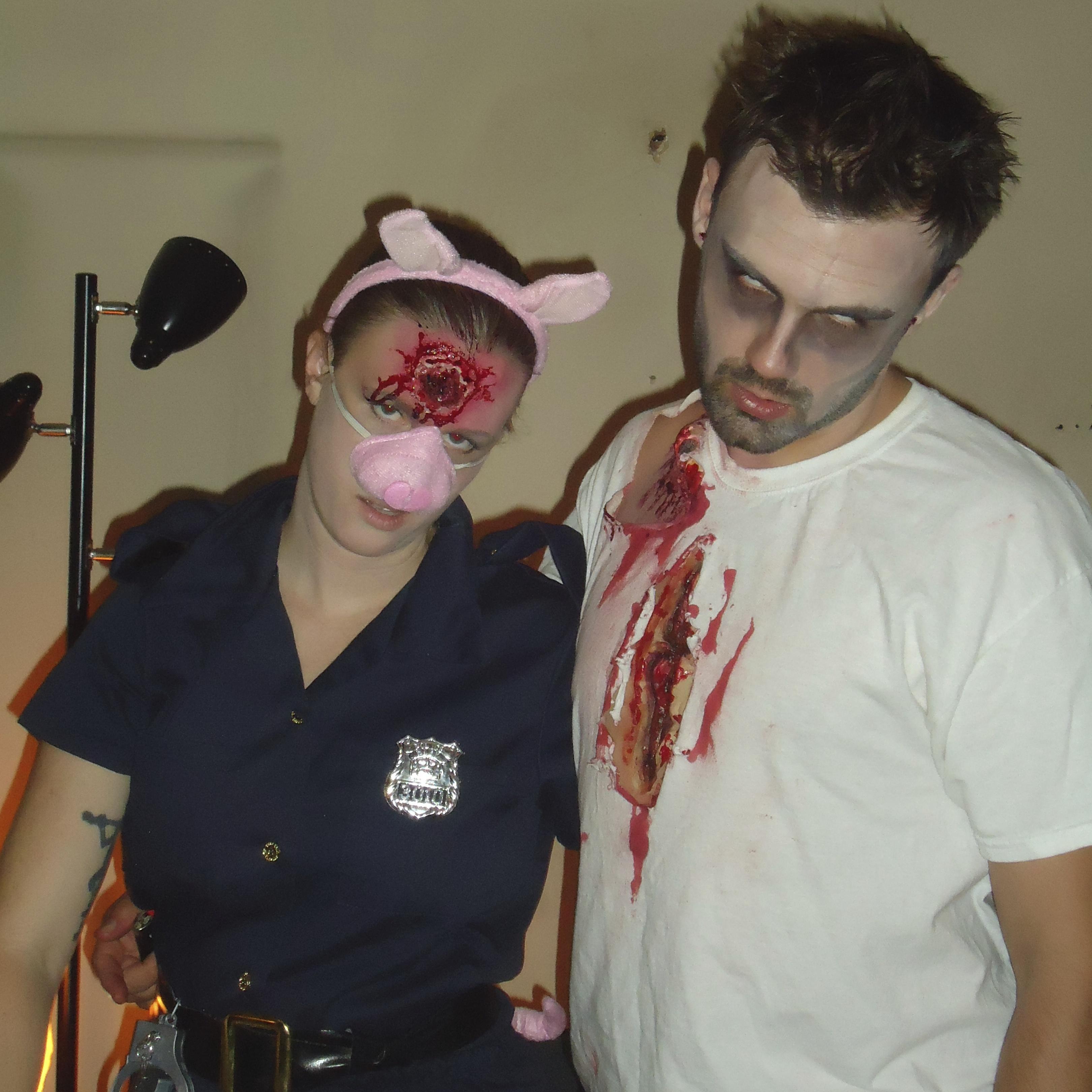 We love dressing up for Halloween! A zombie and a dead cop, LOL