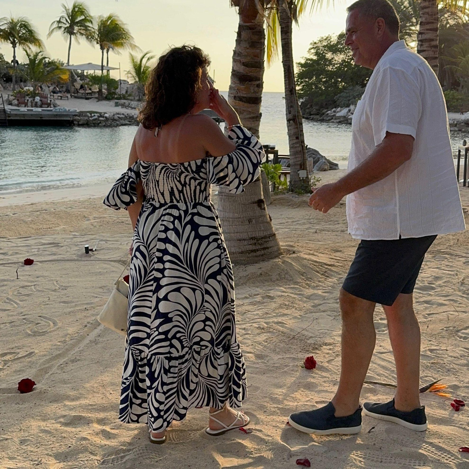 In that moment, I realized the rose petals and the heart in the sand---the words "Will You Marry Me"---were meant just for me.
