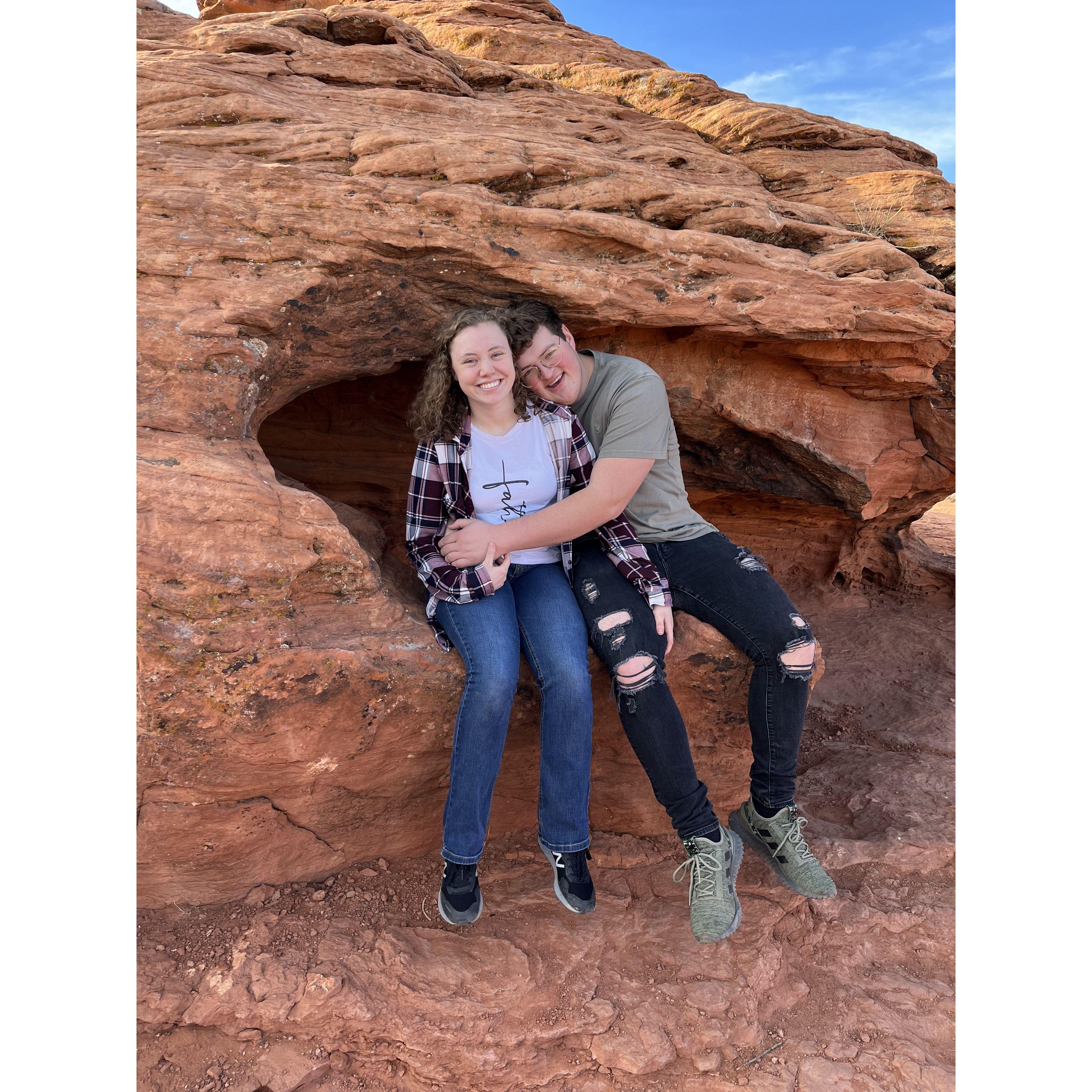 Pausing to take a picture while climbing some rocks in St. George, Utah.