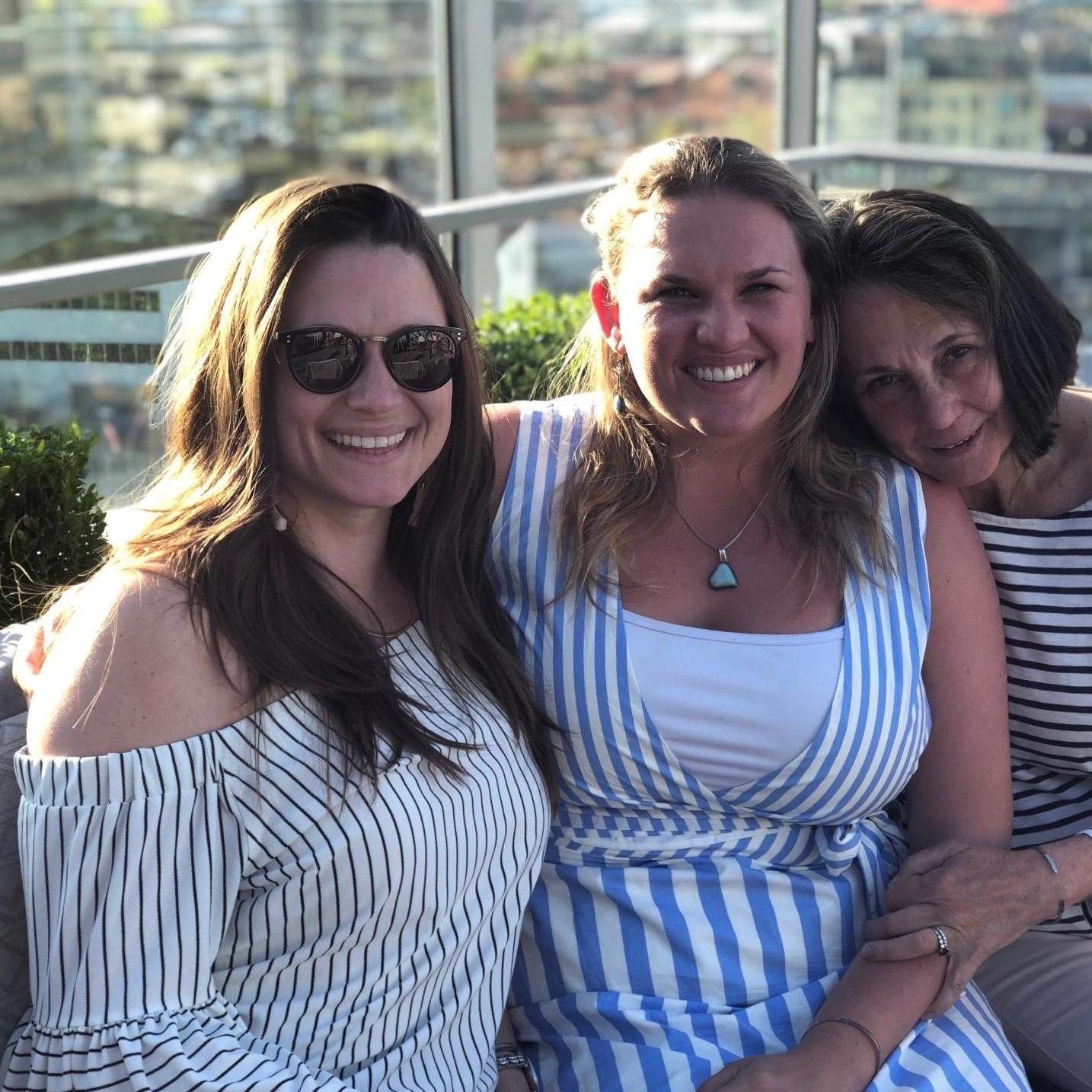 Sara (sister/MOH), Ali and Ann (mom) on a rooftop in Nashville