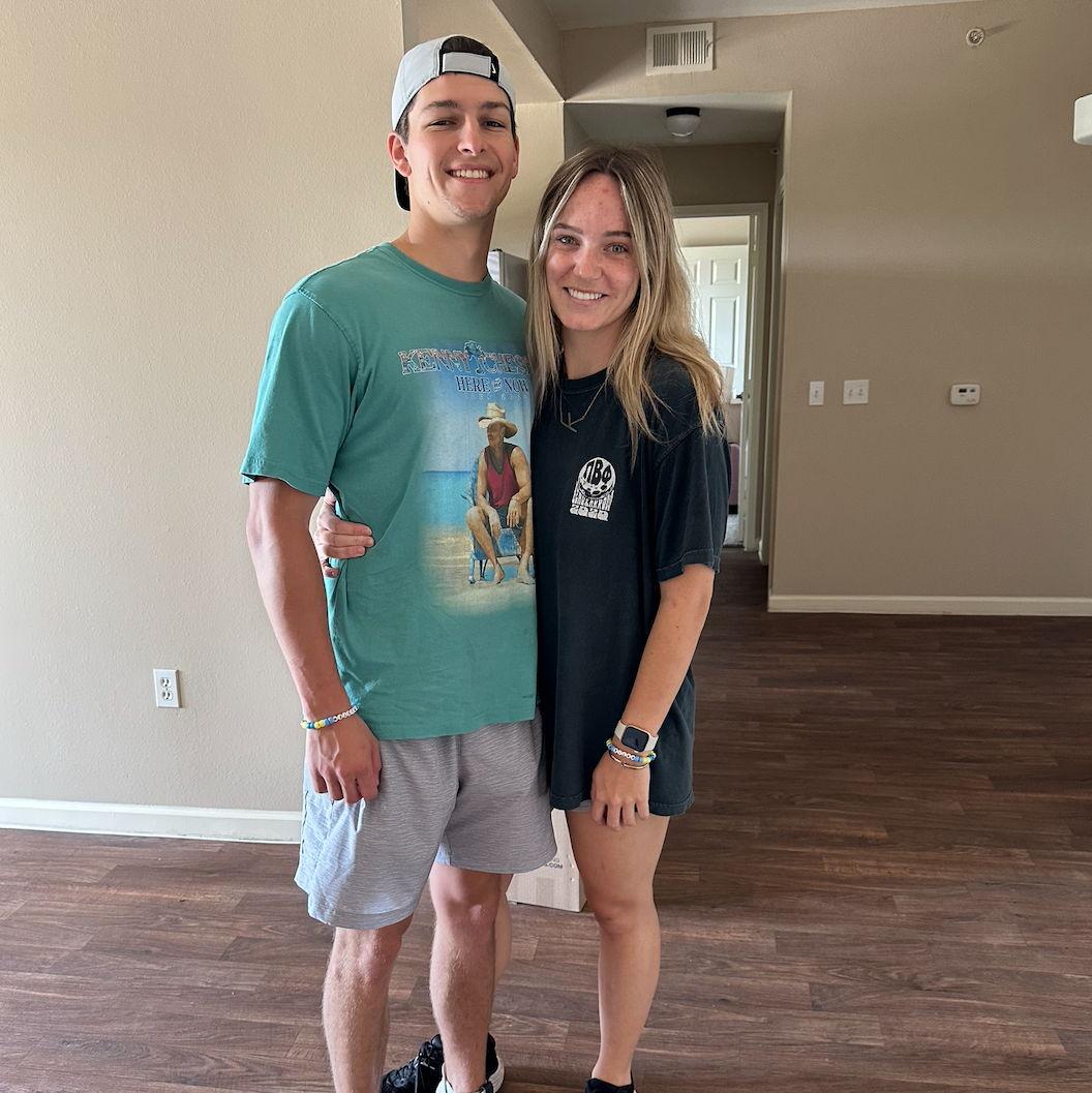 Moving into our first apartment together after graduating college, July 2023.