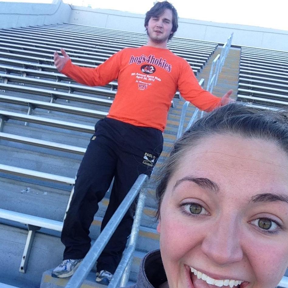 Scott happily running stadium stairs with Hayden in Blacksburg