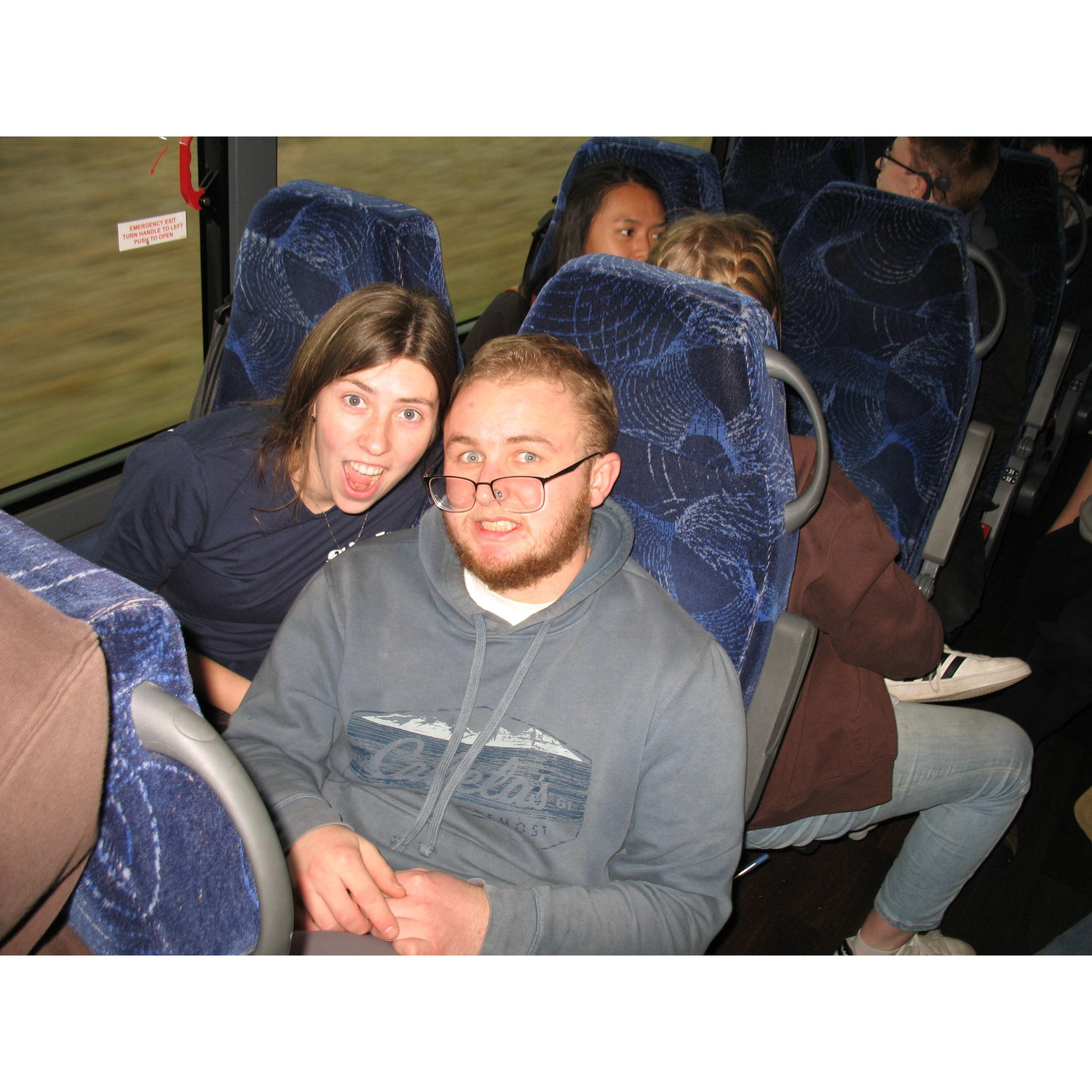 On the bus to SEEK! Quinlan says that Aaron's eyes are the color of his sweatshirt, and he says hers are the color of the bus seat. Please advise!!