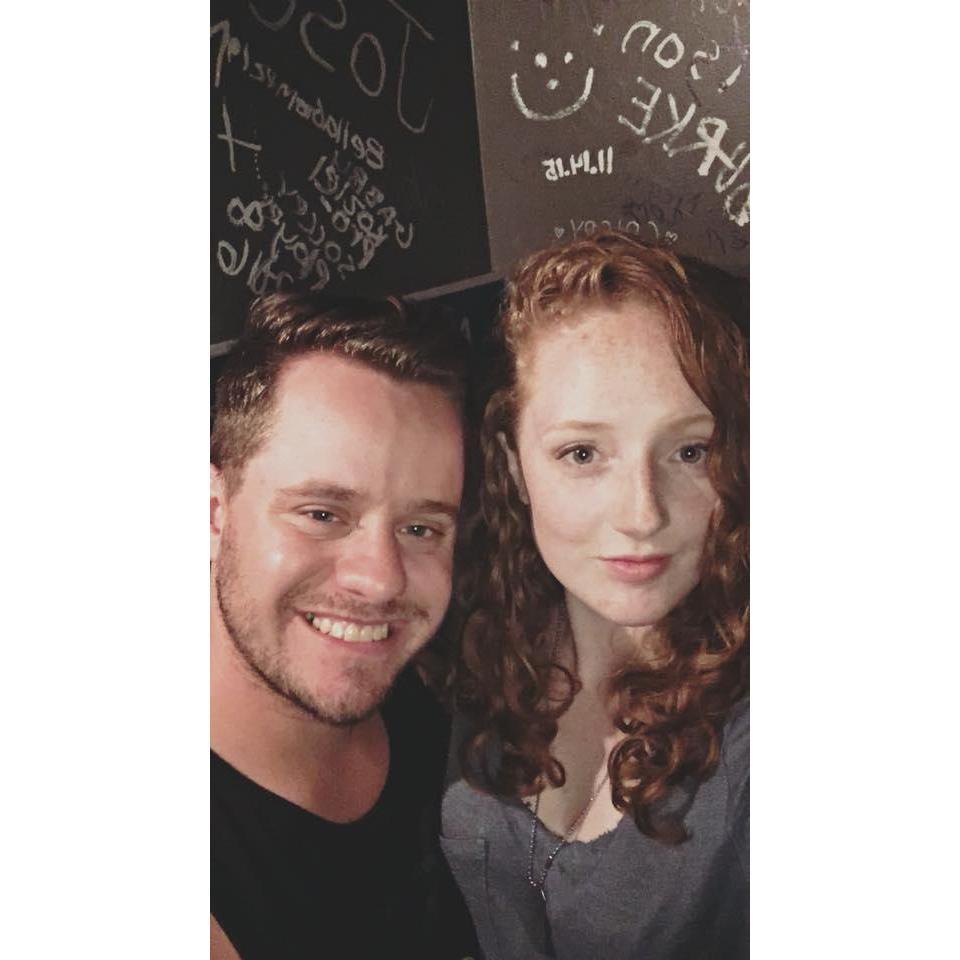 Daniel first said (really, he wrote) "I Love You" on this very wall in a restaurant in Chicago while on a weekend trip with Ramsey's parents. This is a photo of us revisiting the spot years later