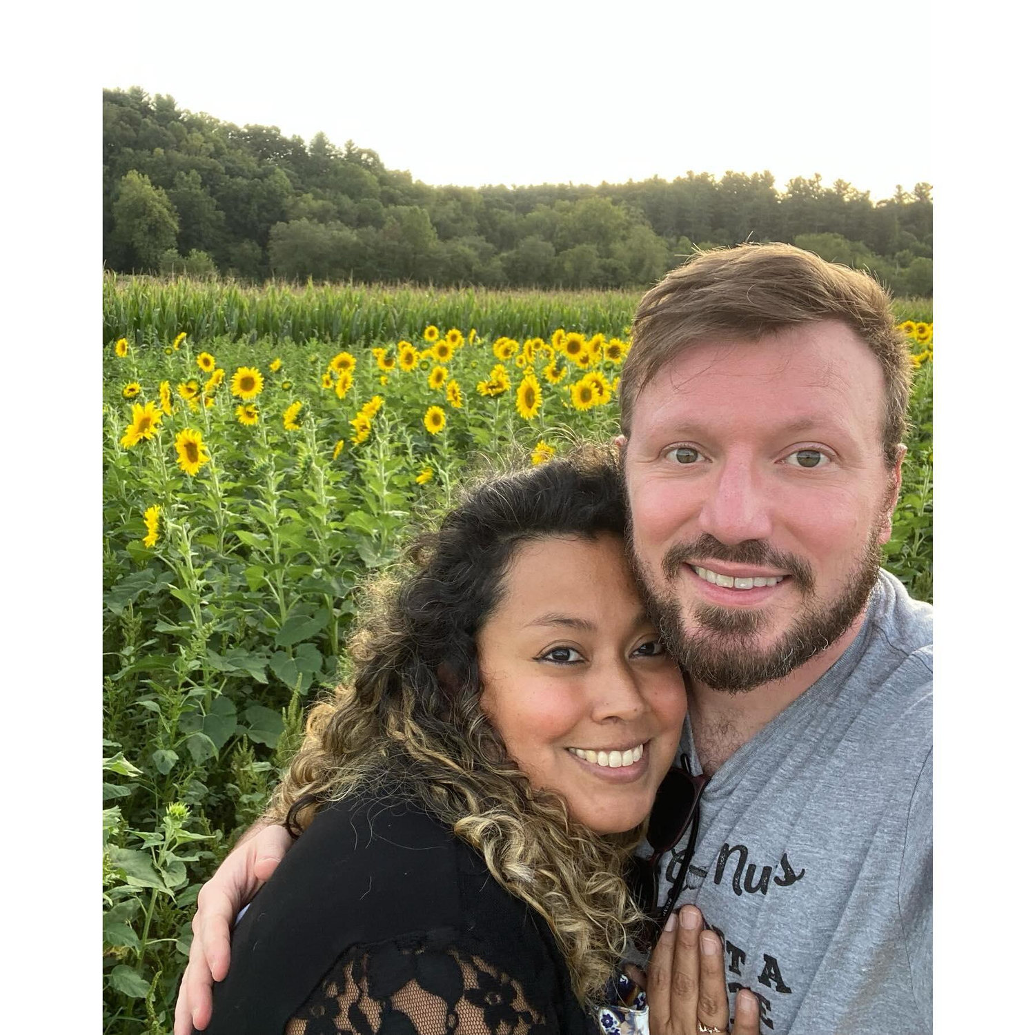 Sunflowers and us in full bloom at the Biltmore where we got engaged.