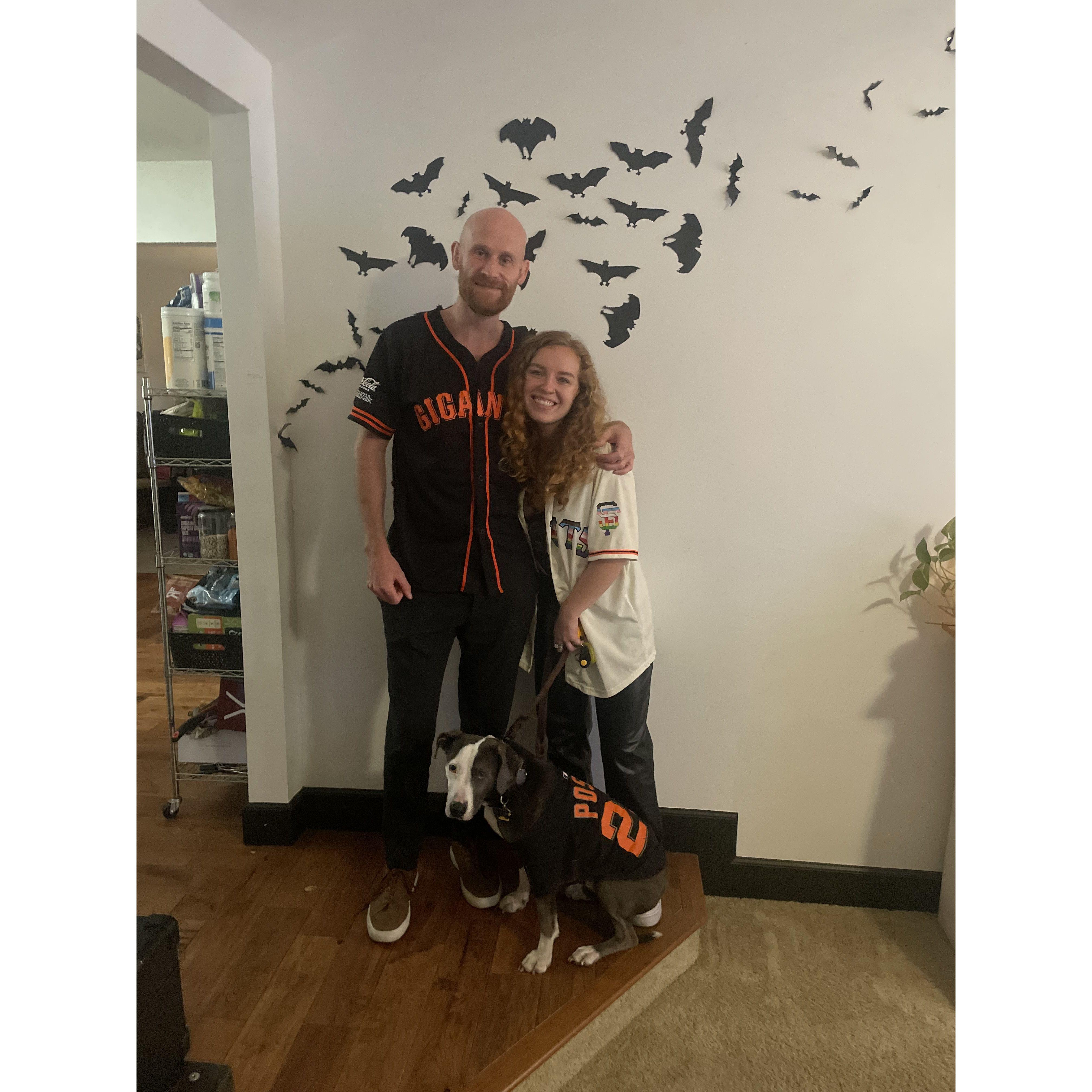 Katie and Buster are slowly turning Andrew into a Giants fan!