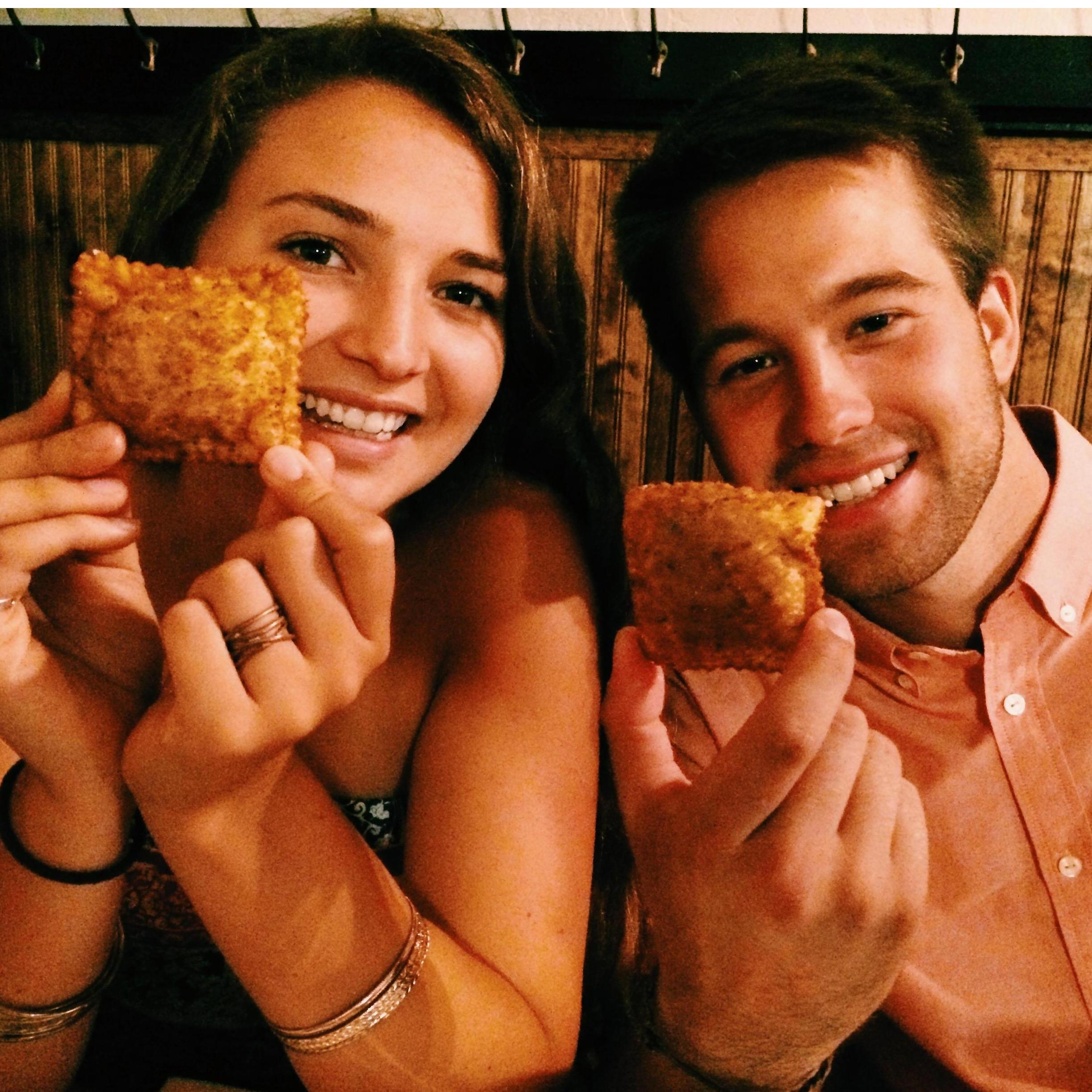 Casey trying St. Louis' famous toasted raviolis for the first time - hooked ever since