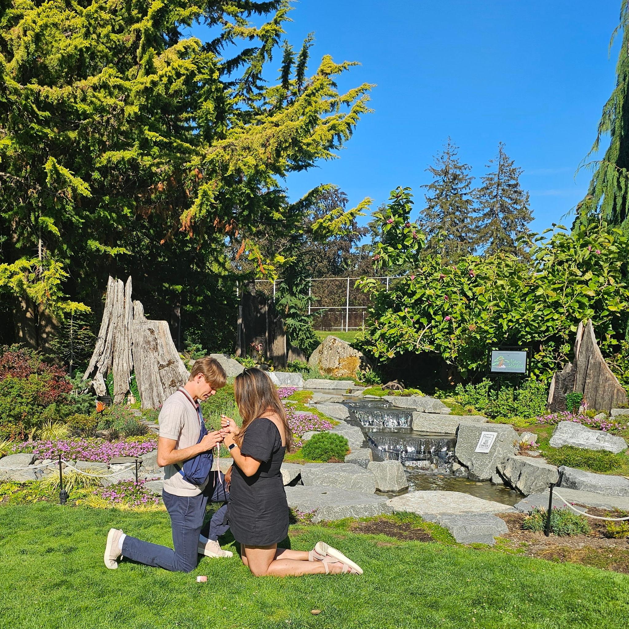 William proposed to Cherokee in August 2024 at the Point Defiance gardens.