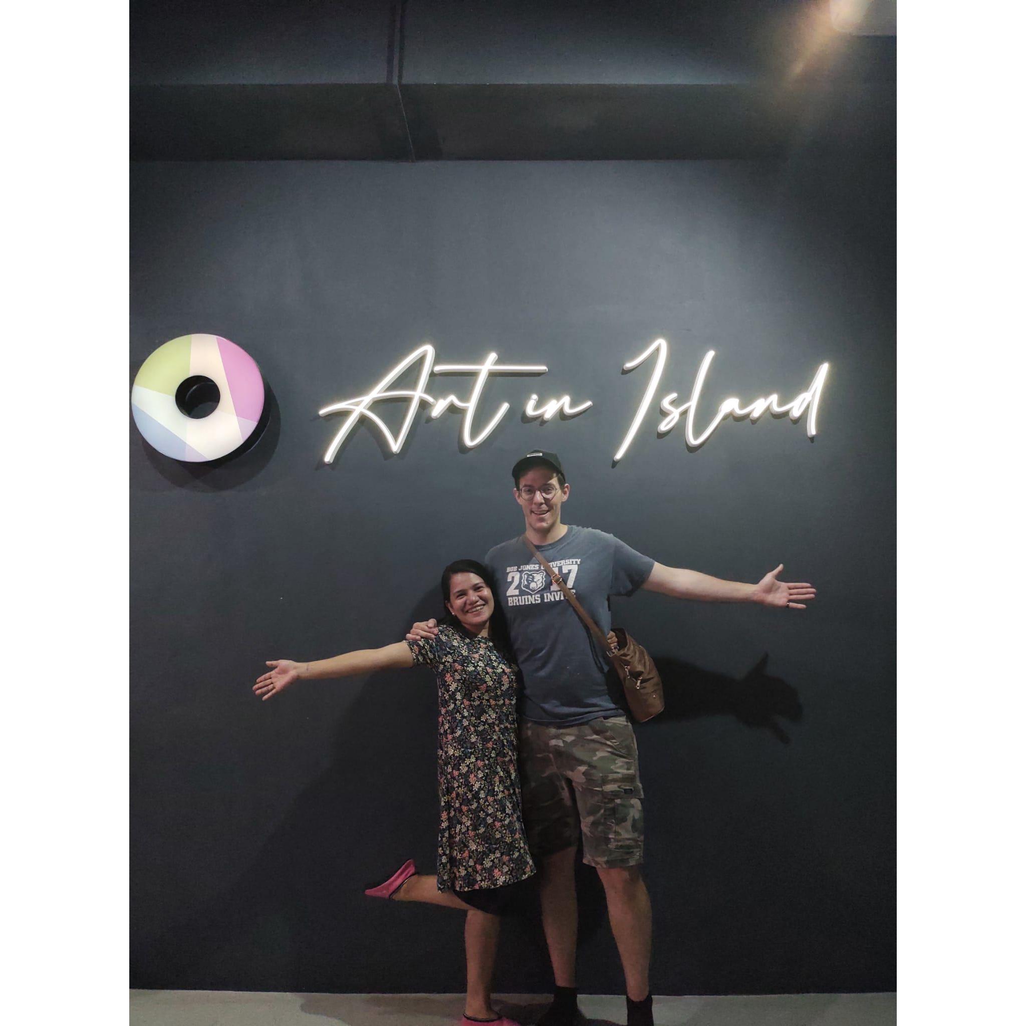 Our Anniversary date at "Art In Island." We asked a stranger who was in front of us to take our picture.