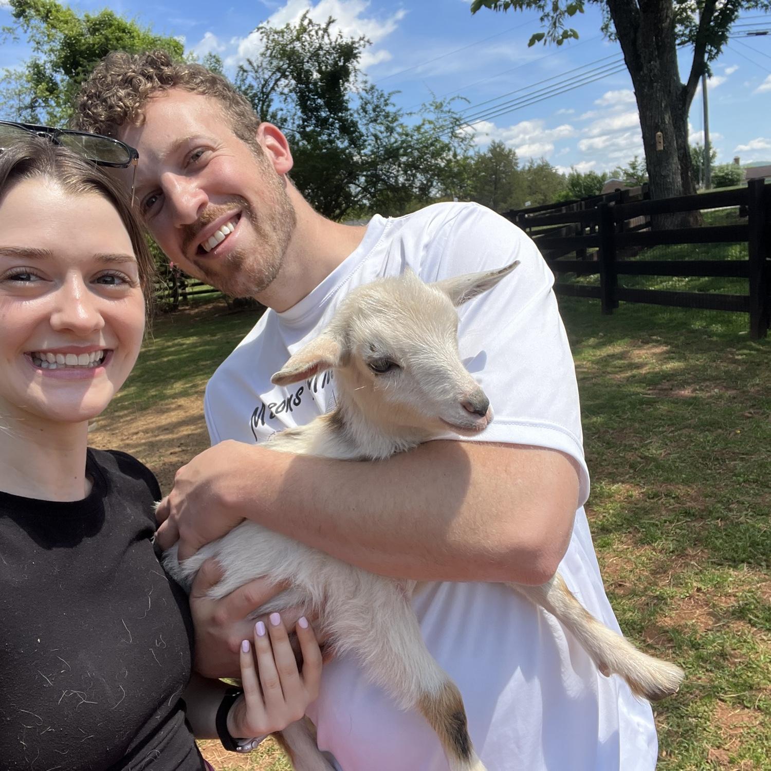 Celebrating Aaron's 30th birthday in Charlottesville, VA by visiting a local farm and holding baby goats. May, 2023.