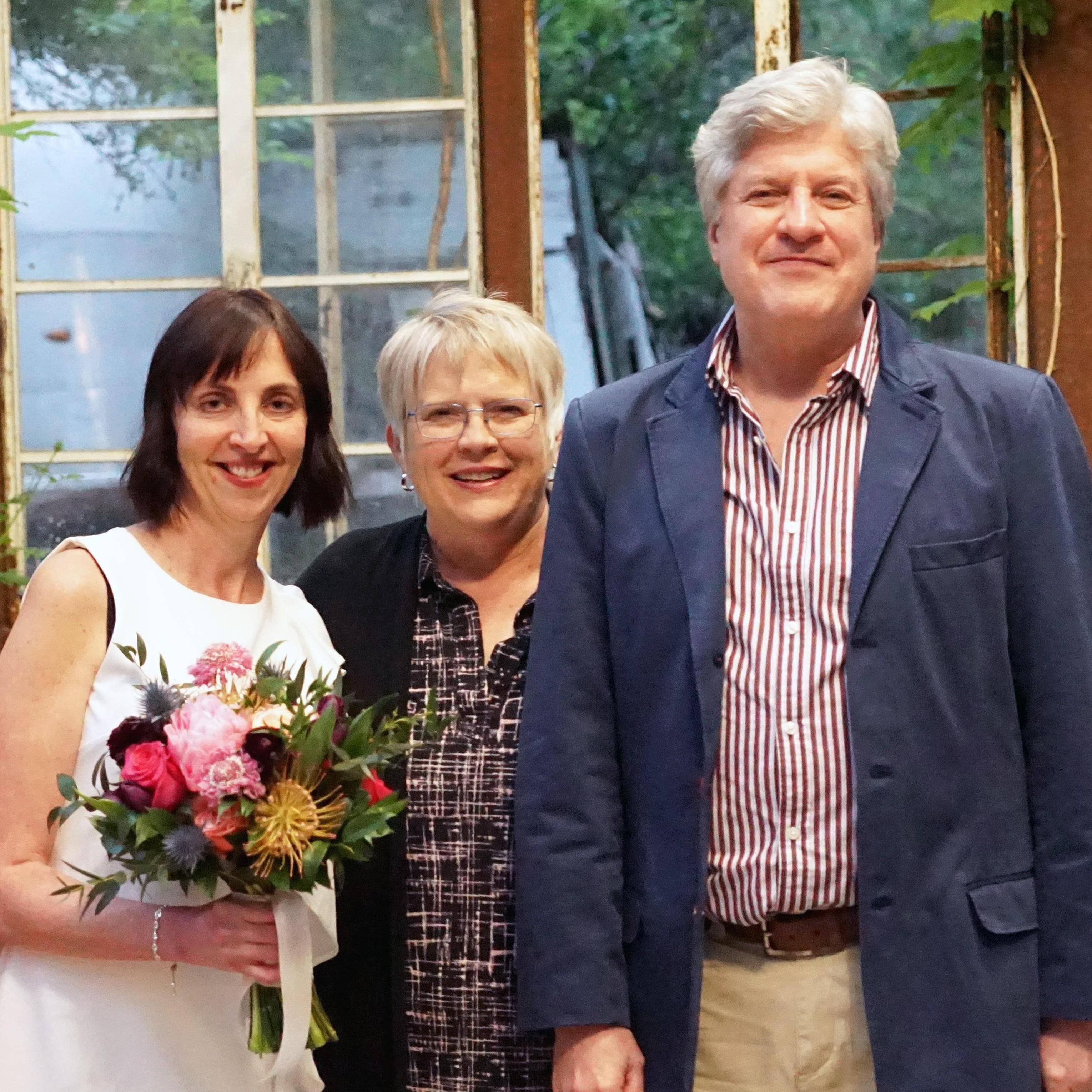 The newlyweds with friend Sarah, our ace officiant. Friend Carrie, our ace photographer, didn't make it into any of the photos (but we'll get some of her at the November celebration).