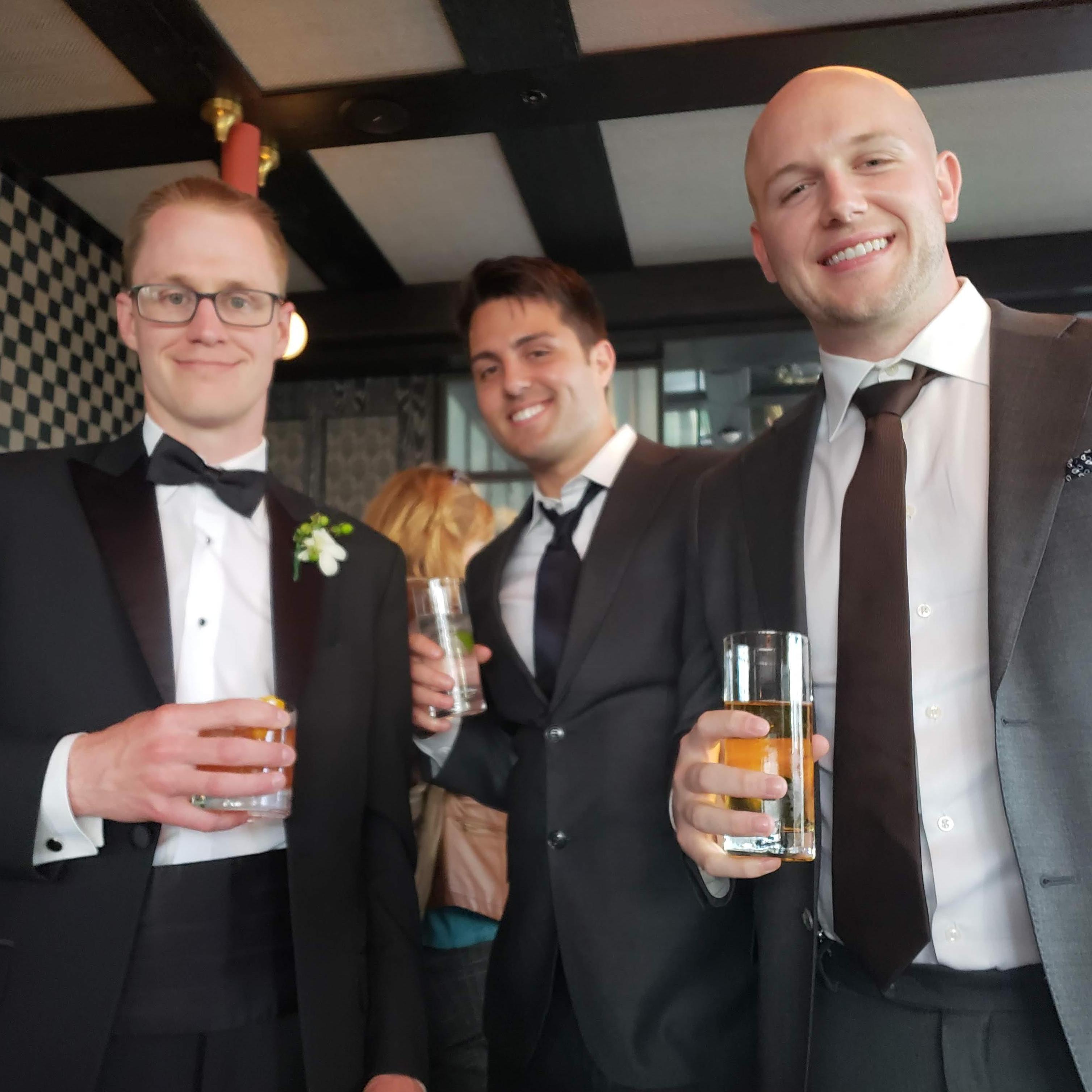 The guys celebrating at Charmaine's Rooftop Bar & Lounge