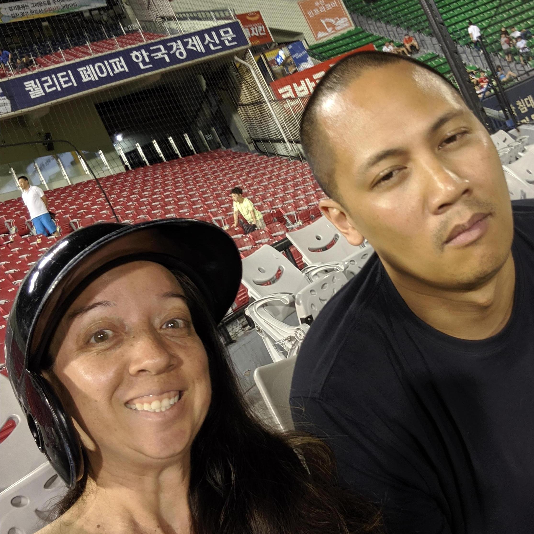Guess who's enjoying the Korean baseball game... in the "exciting" seats!