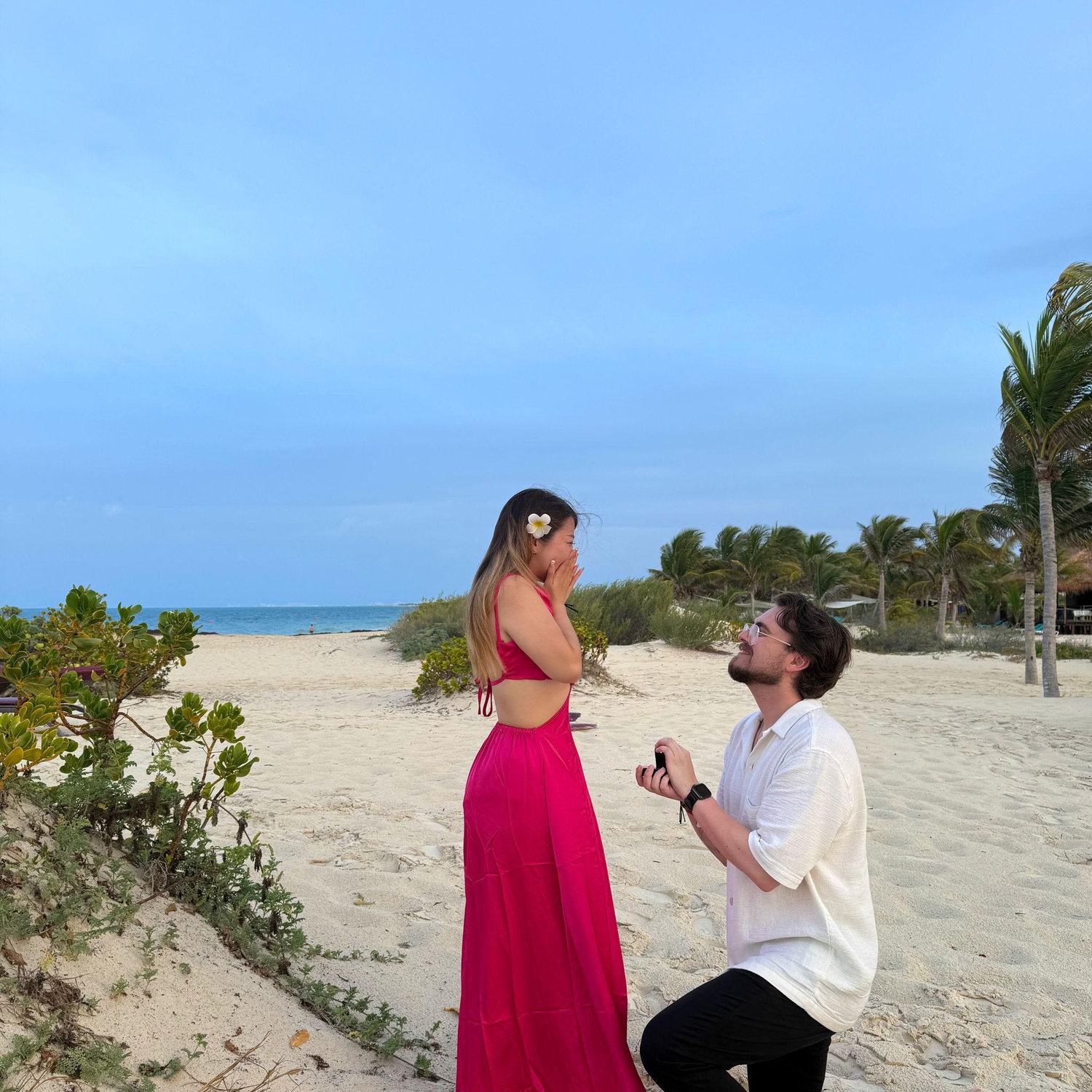 We spent seven unforgettable days in Cancun, Mexico, surrounded by sunshine, ocean waves, and endless laughter. One evening, as the sun was setting and the sky turned golden over the sea, Chris held my hand and led me along the beach. The warm breeze, the sound of waves, and the glow of the sunset made everything feel magical. Then, he knelt down on the soft sand and proposed to me, a moment so romantic and full of love that I’ll cherish forever.