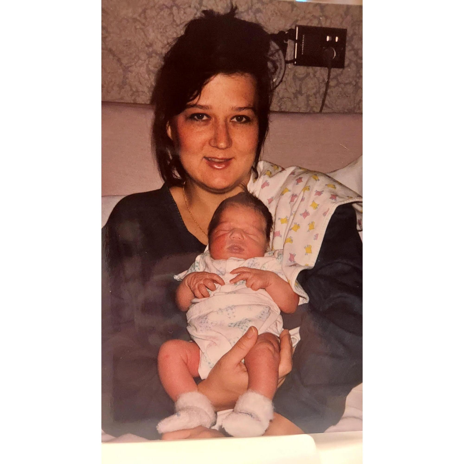 Baby Jordan and mom, Renee. (1997)