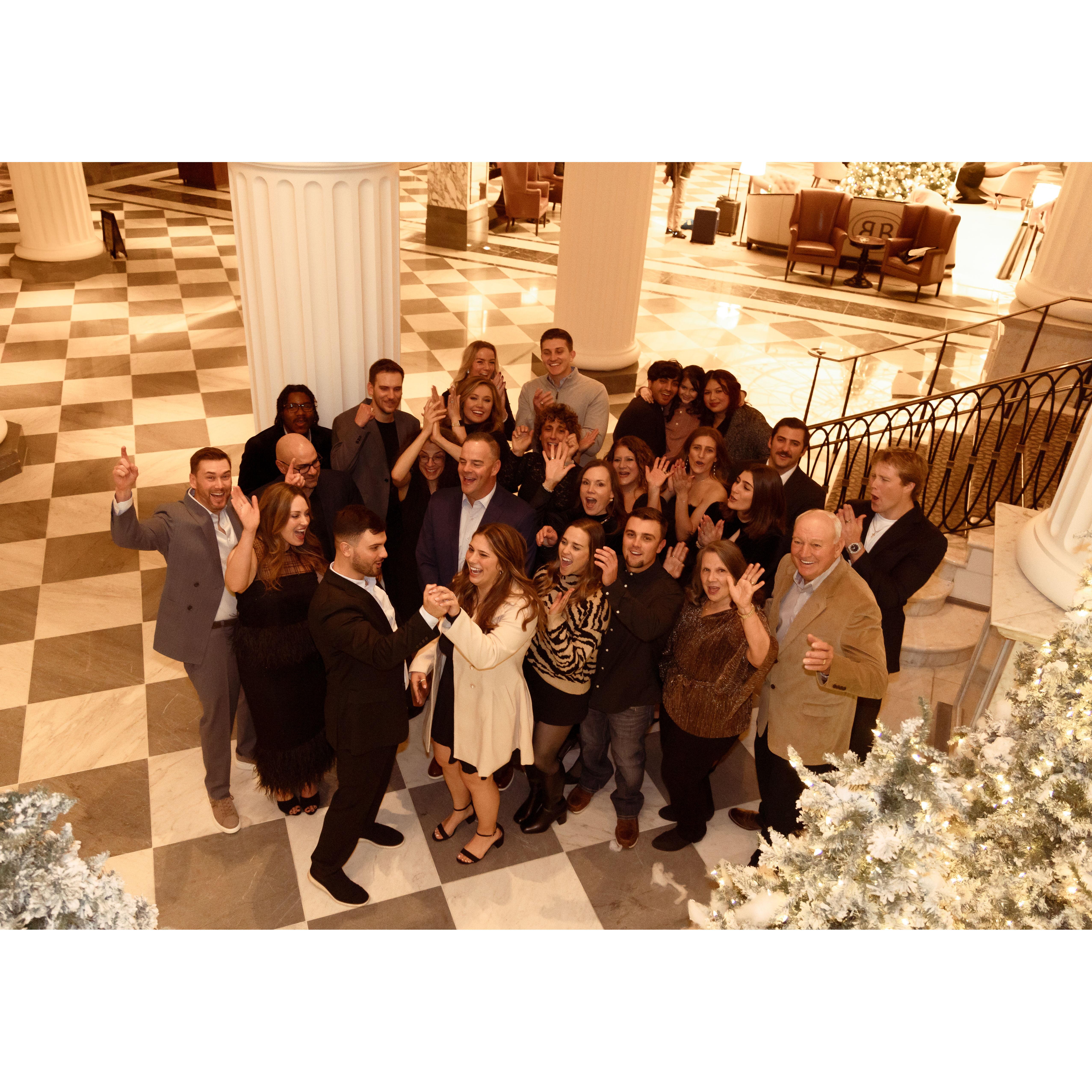 All of our family and friends in New York celebrating our engagement!
