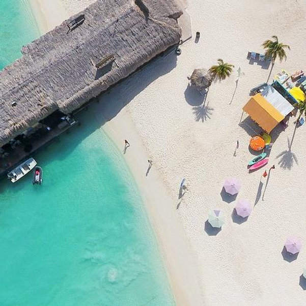 A round of drinks at a beach bar in Aruba