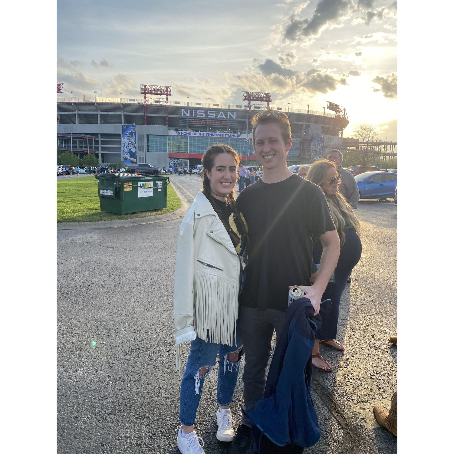 Taken a few weeks into their relationship and minutes before their parents met at an unplanned tailgate