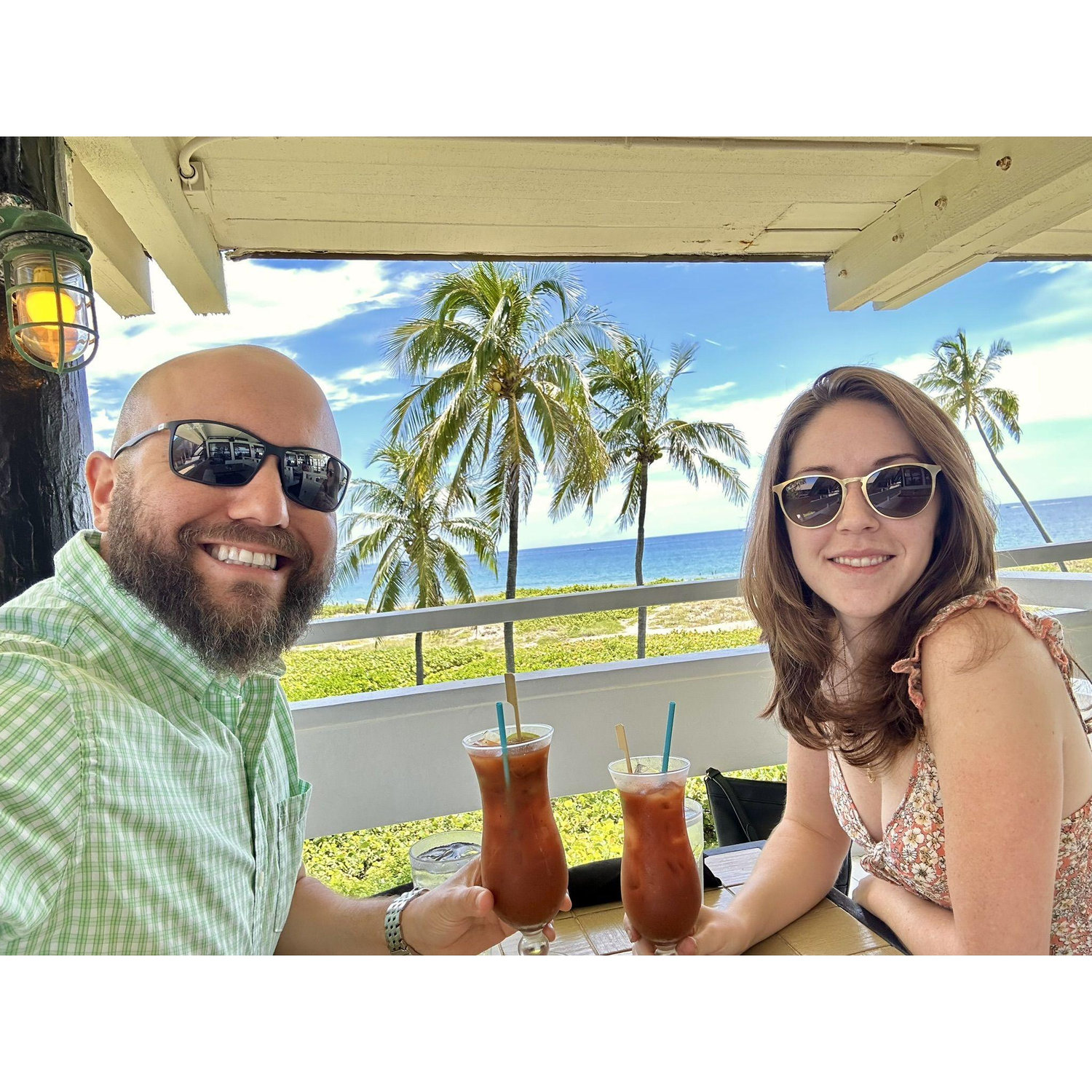Having a Bloody Mary at our favorite brunch spot on the beach.