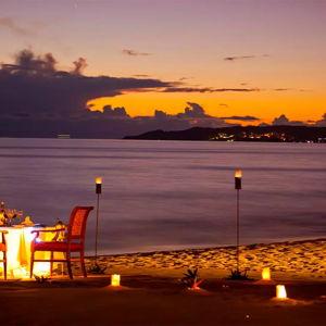 Romantic sunset dinner by the ocean