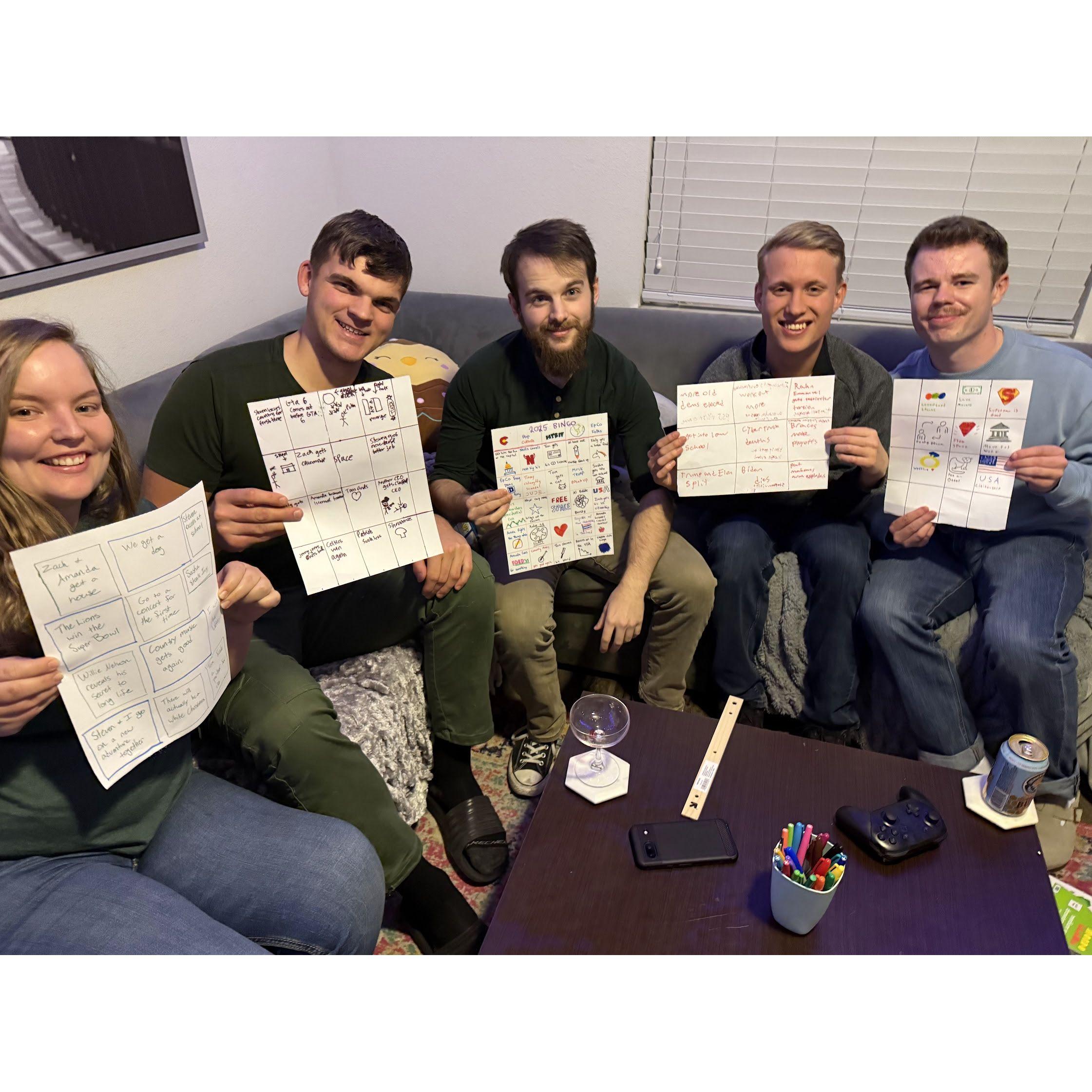 Some of our amazing and lovely friends—Keely, Steven, Sasha, and Tom—ringing in the New Year with bingo cards! 🎉🖤✨