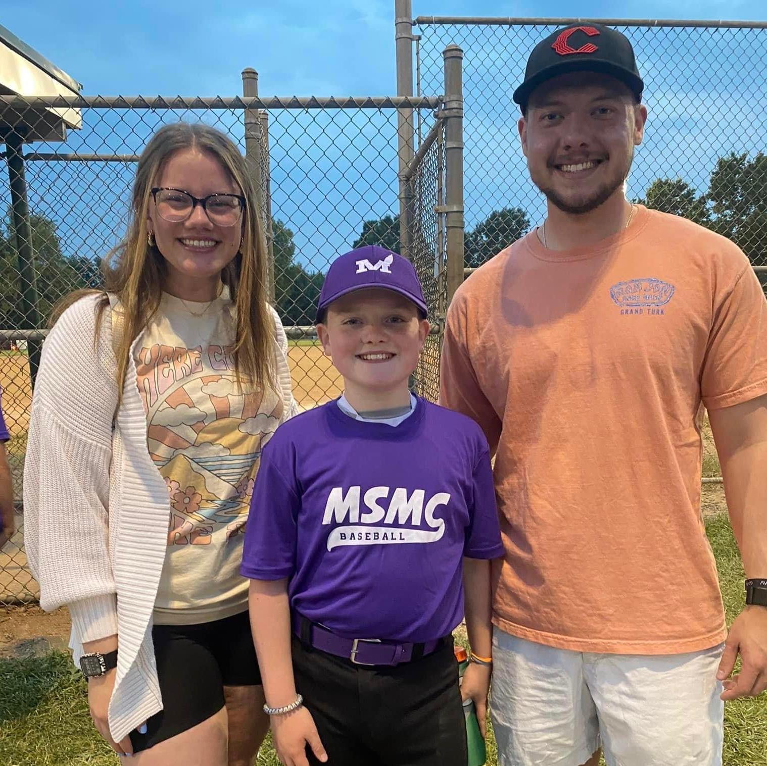 Our first picture together as a "couple" supporting Callen at baseball.