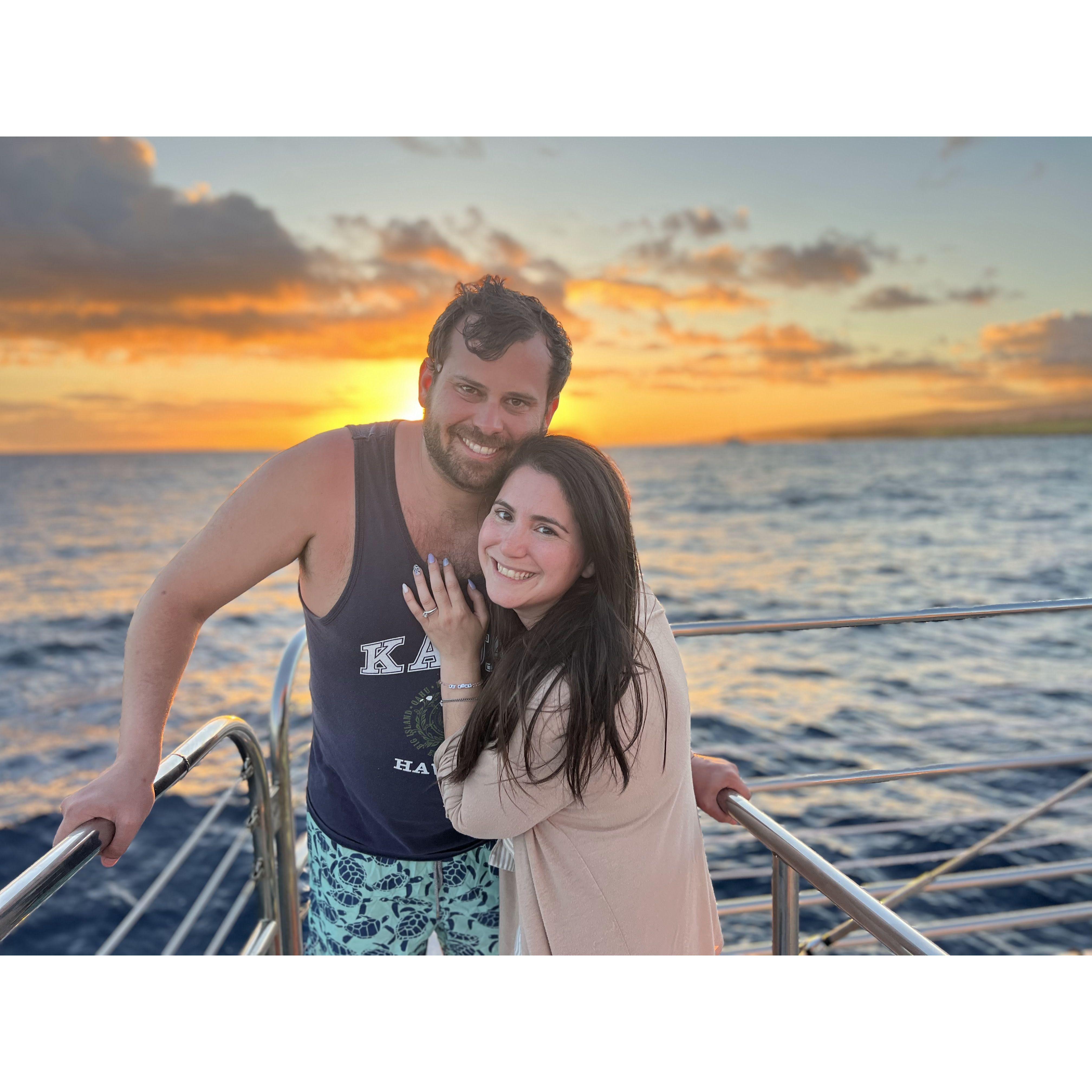 The sunset from the water along the Nā Pali Coast was a highlight of our trip to Kauai