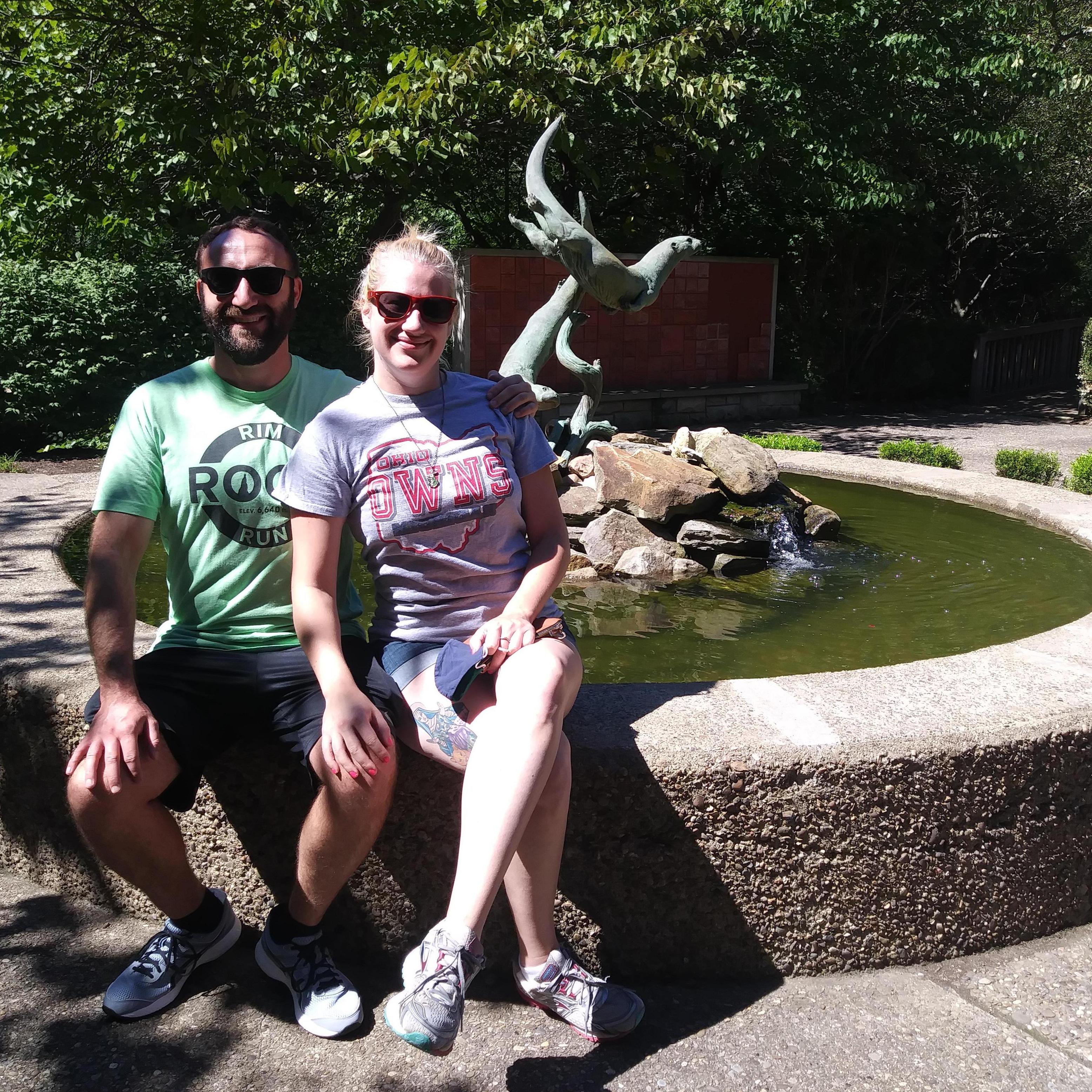Two happy otters at the otter fountain at the Oglebay Good Zoo.