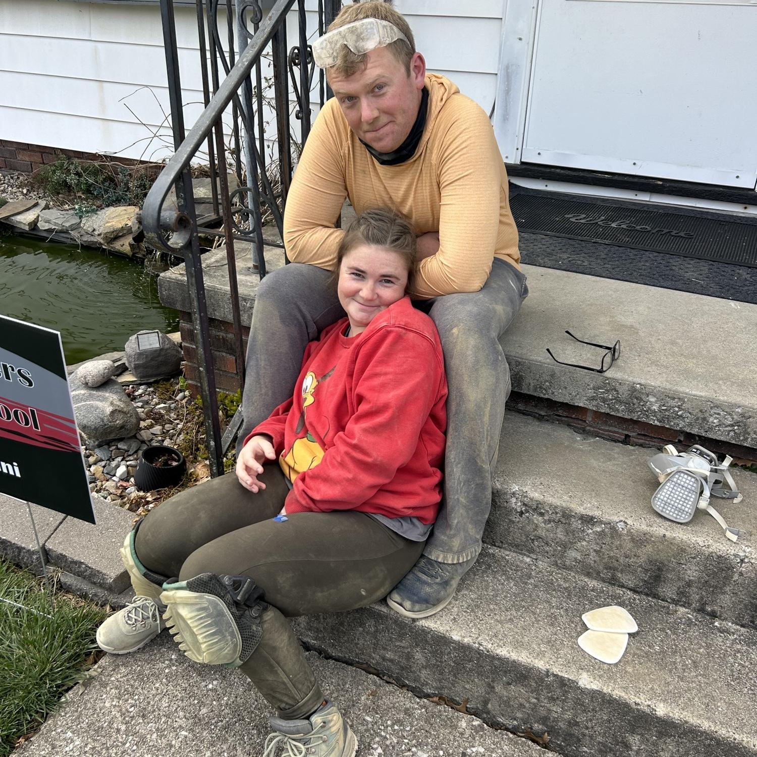 One of the only pictures we have as new homeowners! This was after a long day of sanding our hardwood floors to refinish them.
