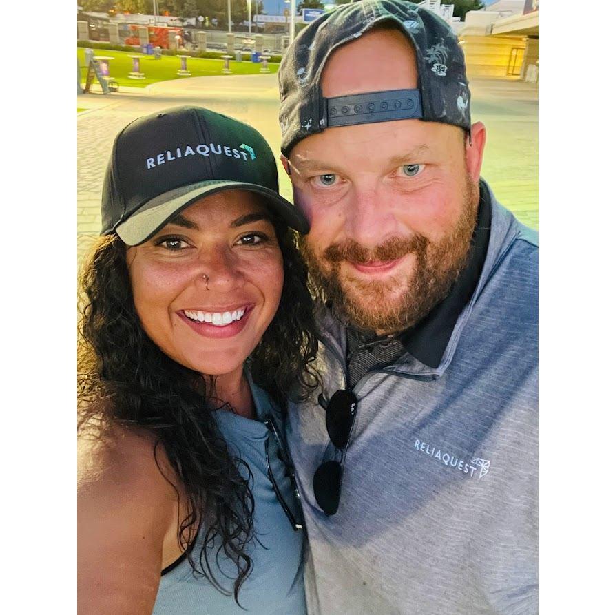 Katie won a hat at Adam's work event!