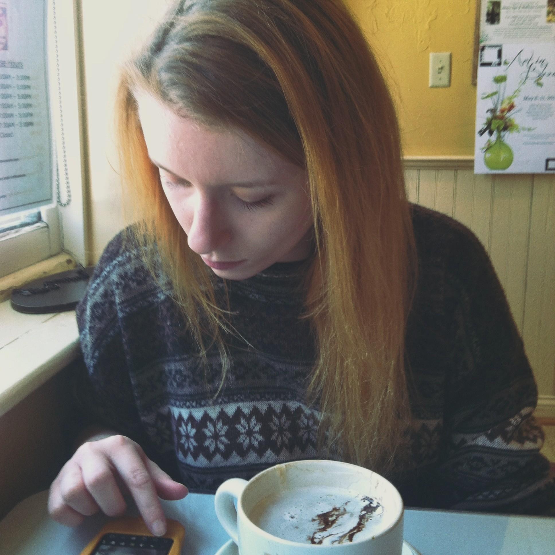 April 23rd, 2014:
Emilio snapped a photo of Samantha at a coffee shop in Toledo. 📸