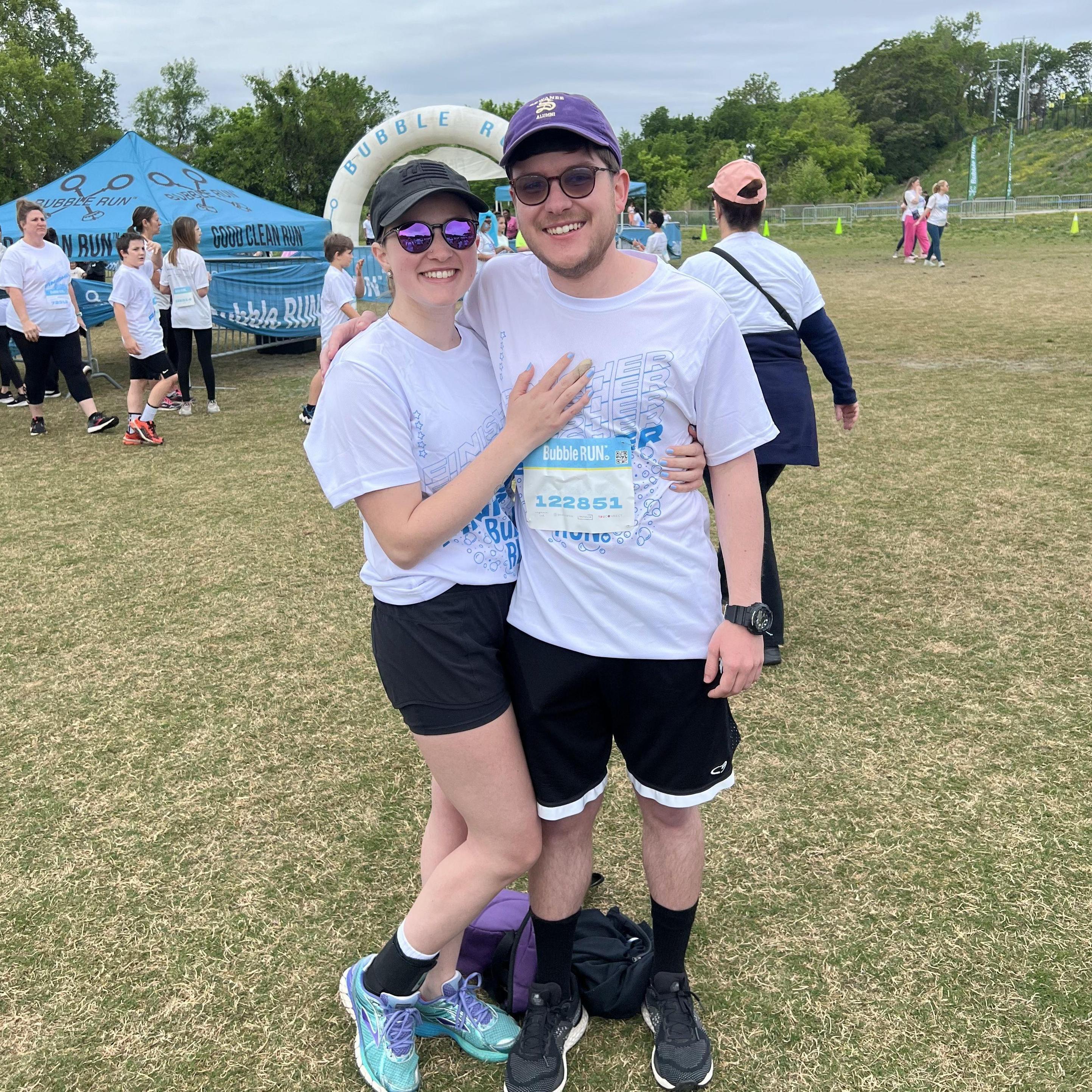 May 2023: Will doing his best to get Nicole to like running.