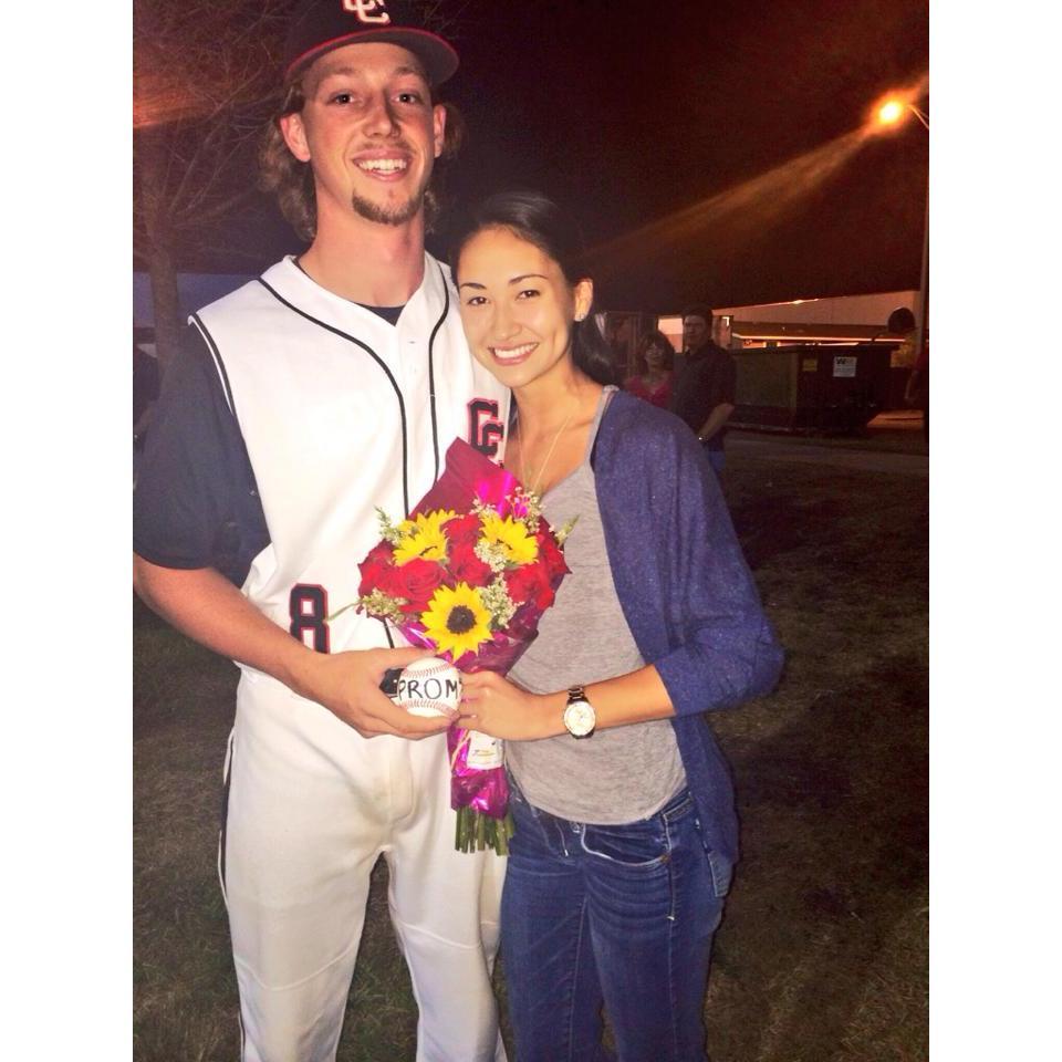 Tyler rolled a baseball to me after his game that had "PROM?" written on it...I let it roll pass me because I didn't know what was happening LOL