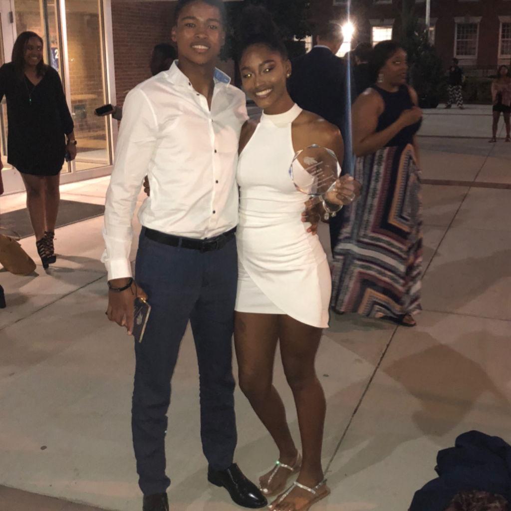 Aria and Roger's first "nice" picture at our Sports awards ceremony -- they both liked each other here but neither of them knew - April 2018