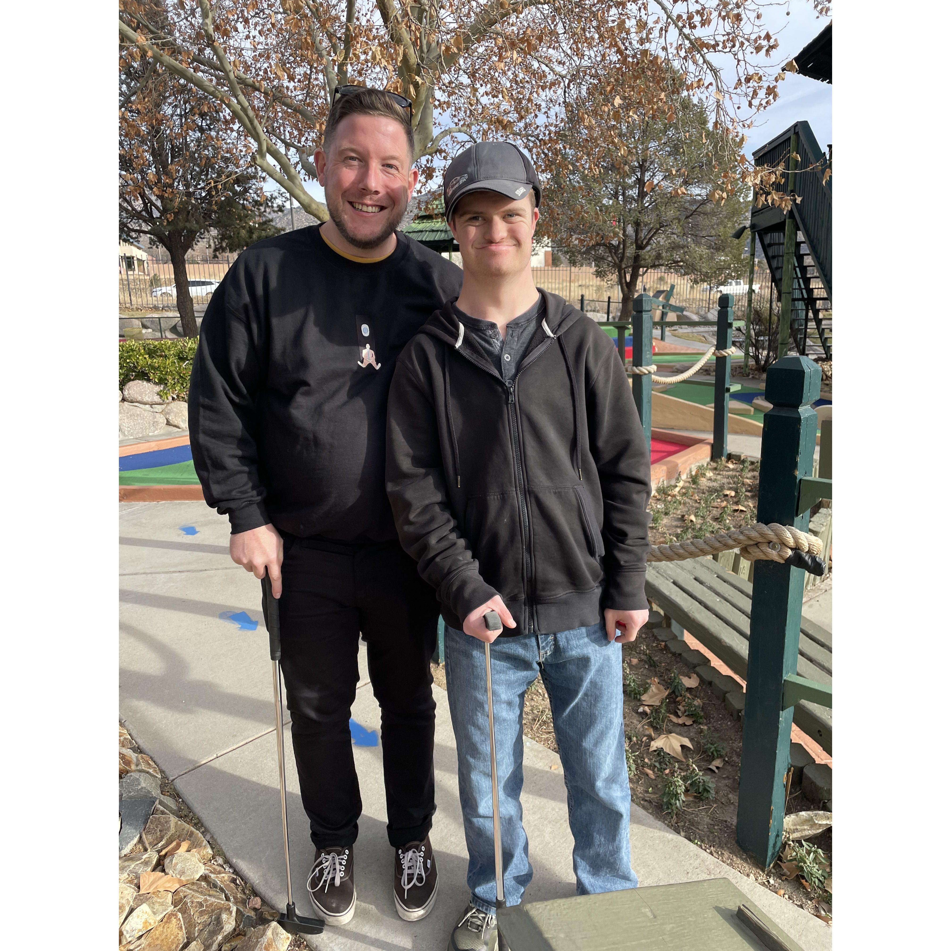 Mikey kicking Mark's booty at mini-golf!