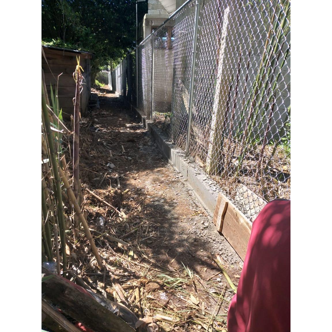 The fence coming along...
