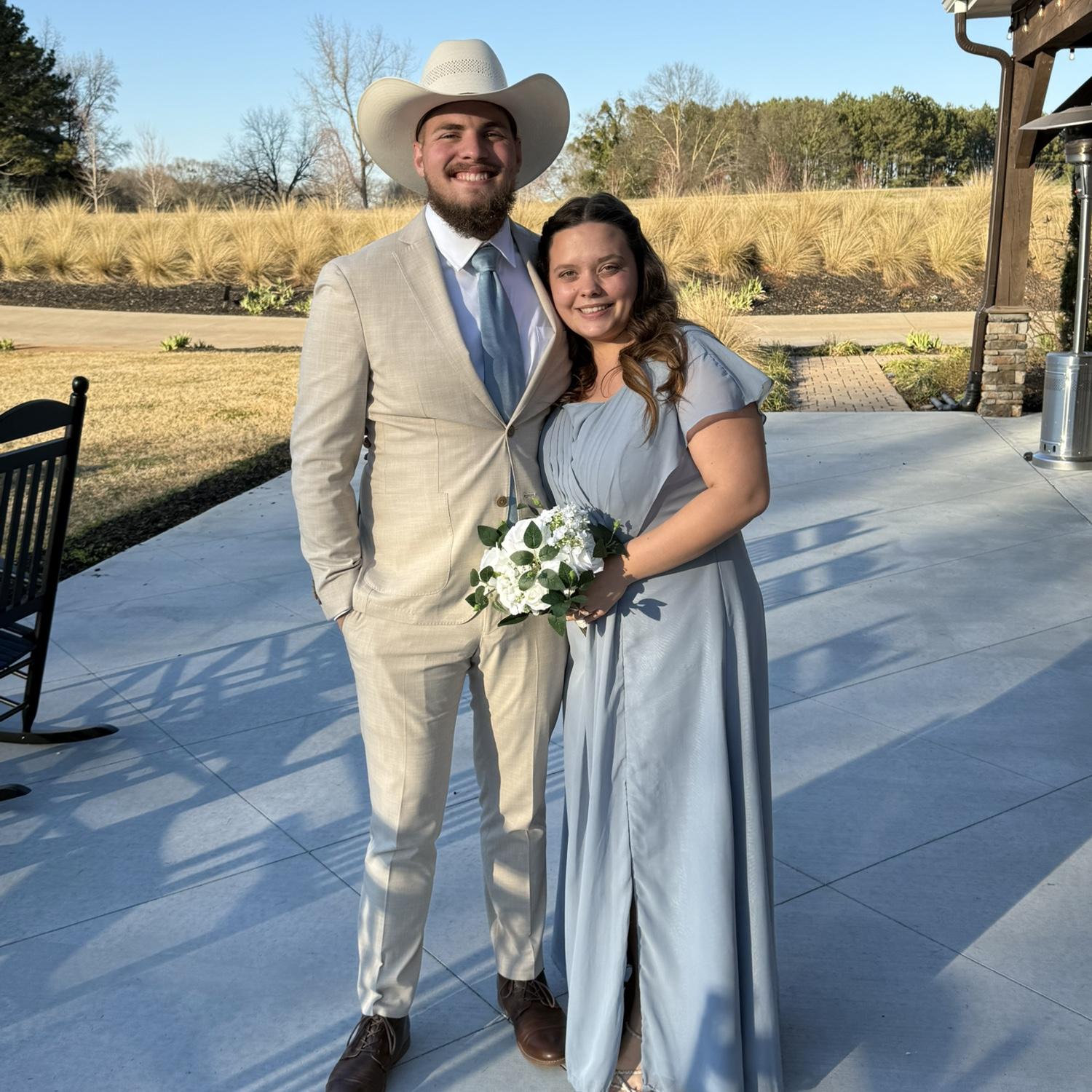 The most beautiful maid of honor ever seen, standing with her future husband