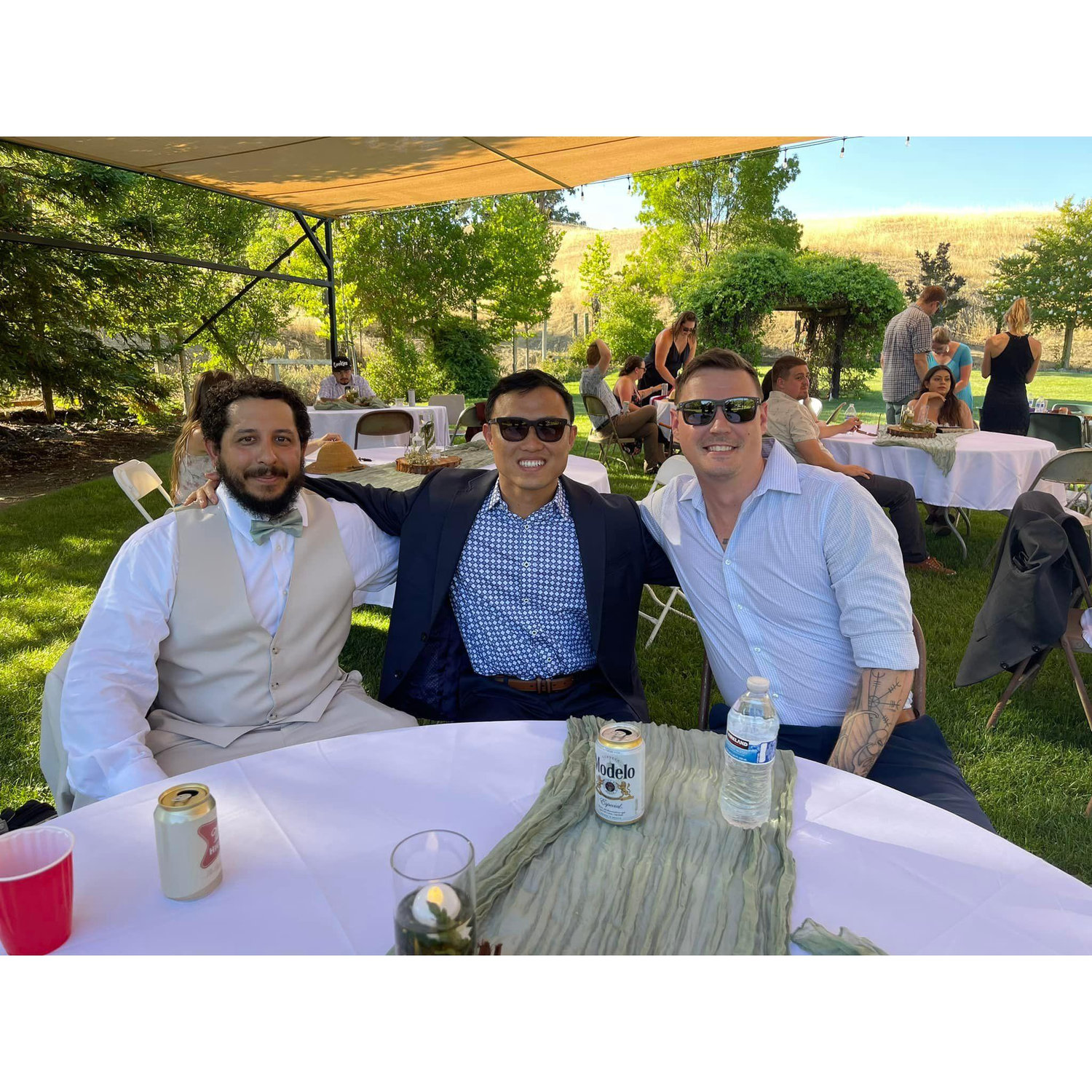 Hildalgo, Zhou, and Ricky at Mora's wedding