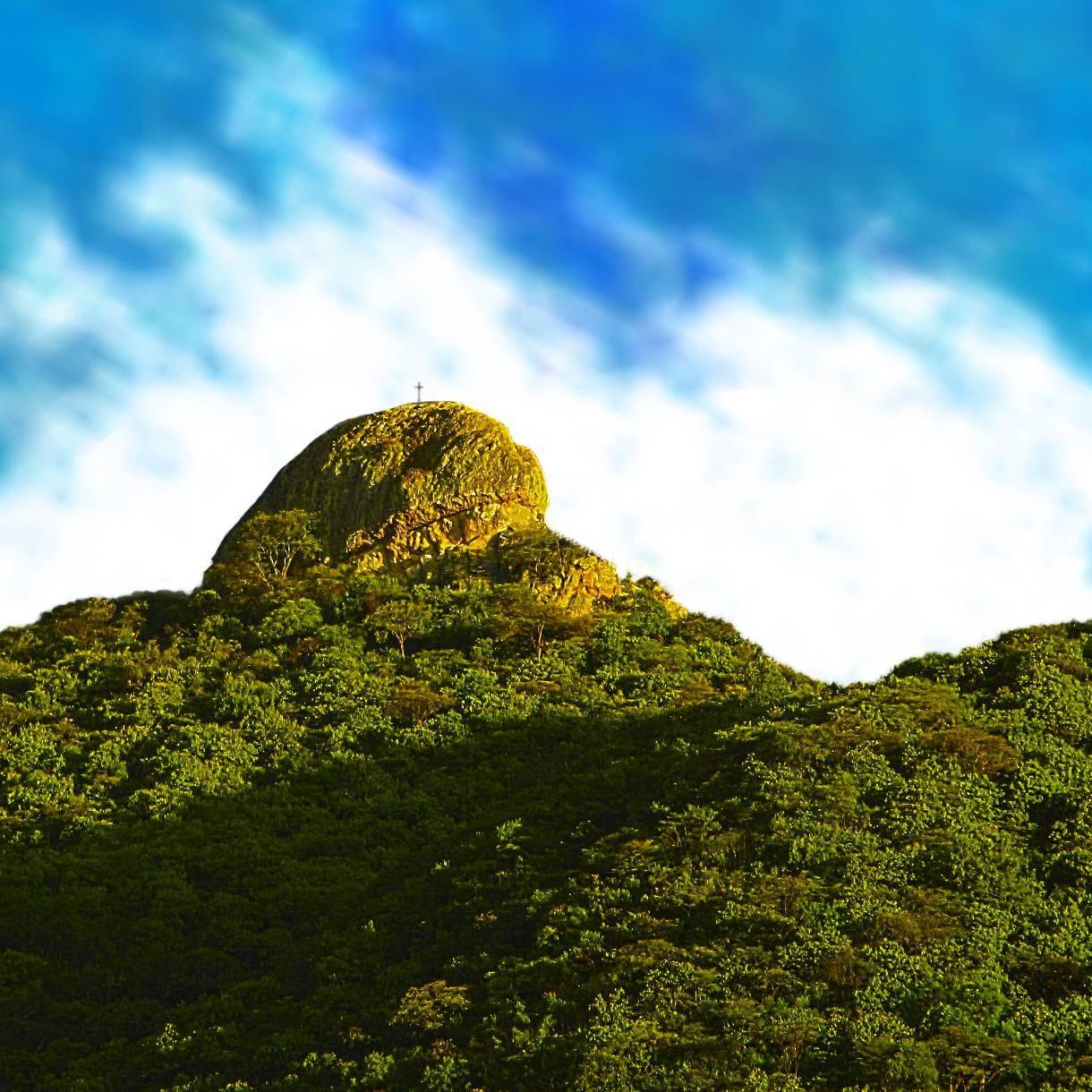 Piedra de la Tortuga. The cross above the rock is about 10 feet tall for scale. 