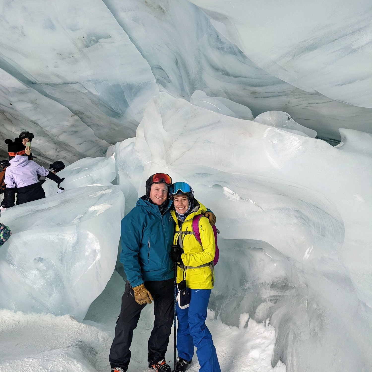 Ski across a glacier to the entrance of an ice cave at Whistler.